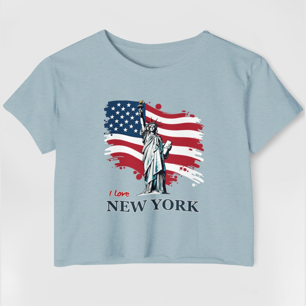 A light blue crop top t-shirt with printed colorful theme