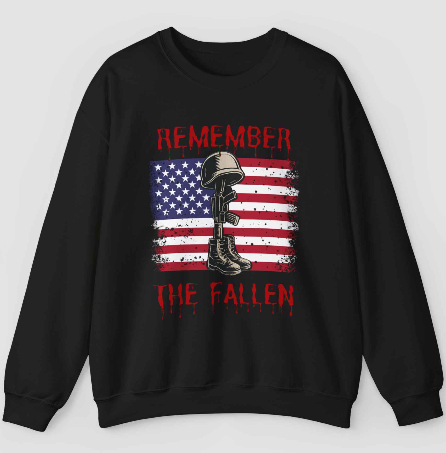 Black sweatshirt featuring "Remember the Fallen" text and vintage American flag and soldier gear in a gray background.