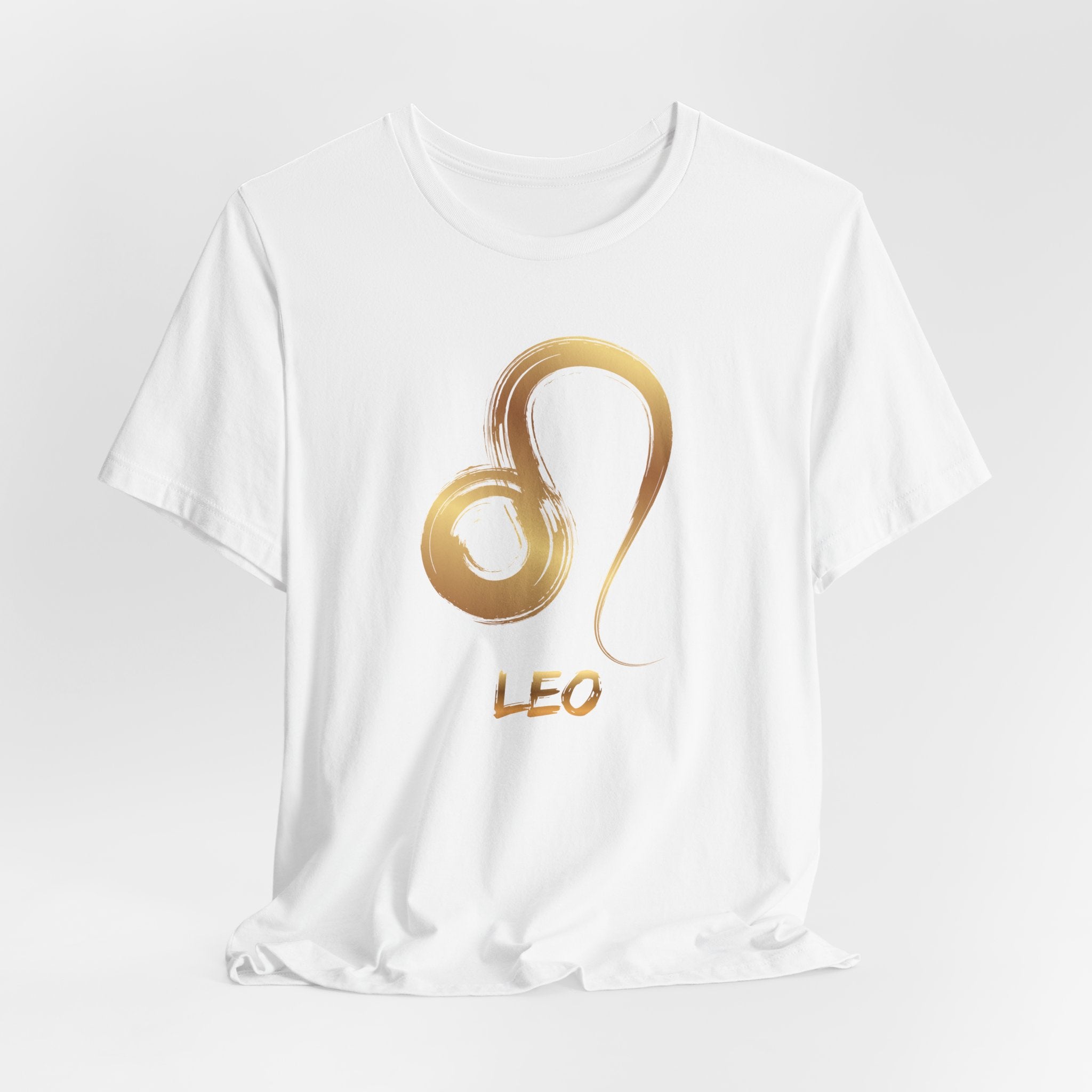 White t-shirt with a gold Leo zodiac symbol on a white background