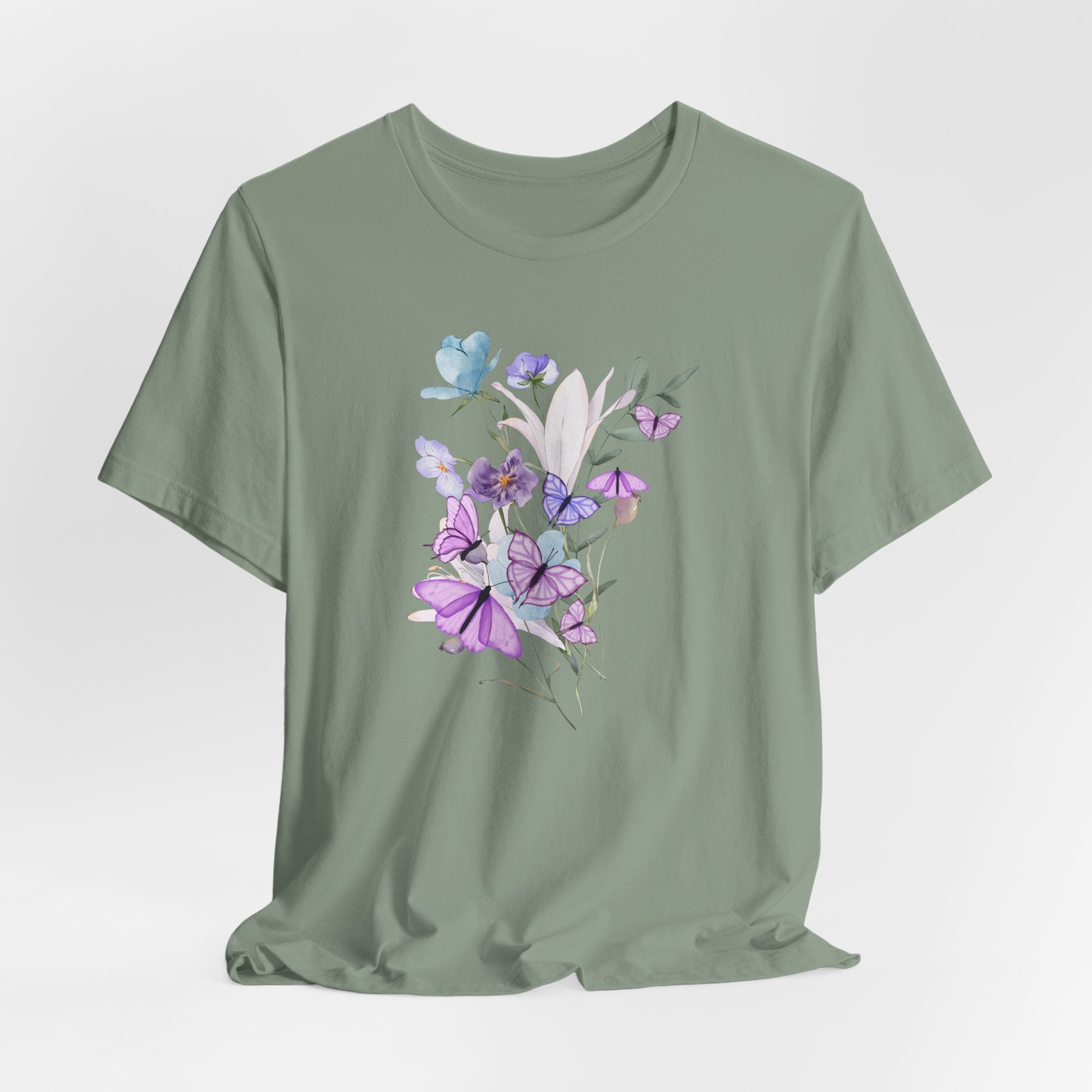 Green t-shirt with floral design on a light gray background