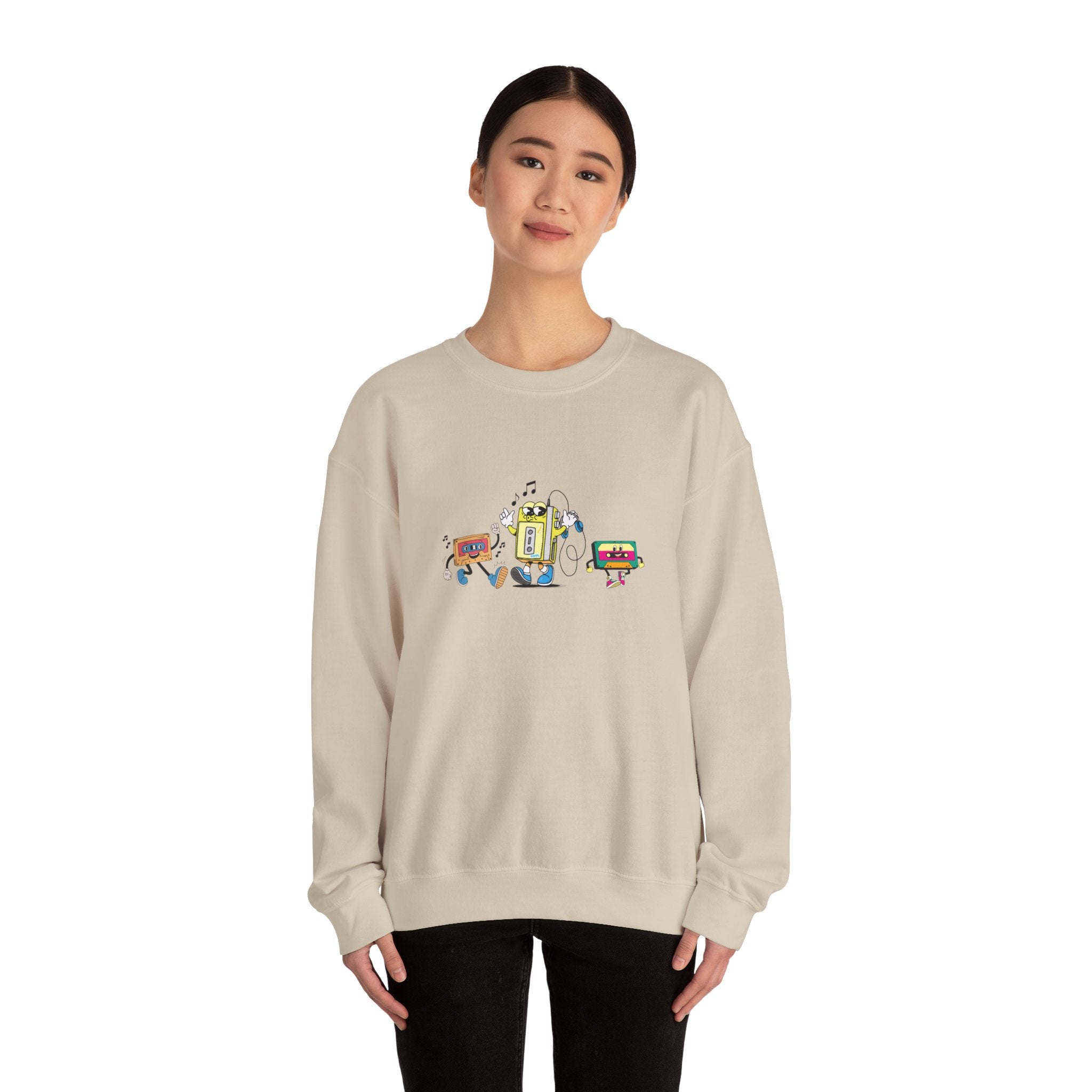 Person wearing a beige sweatshirt with a colorful graphic design on a white background