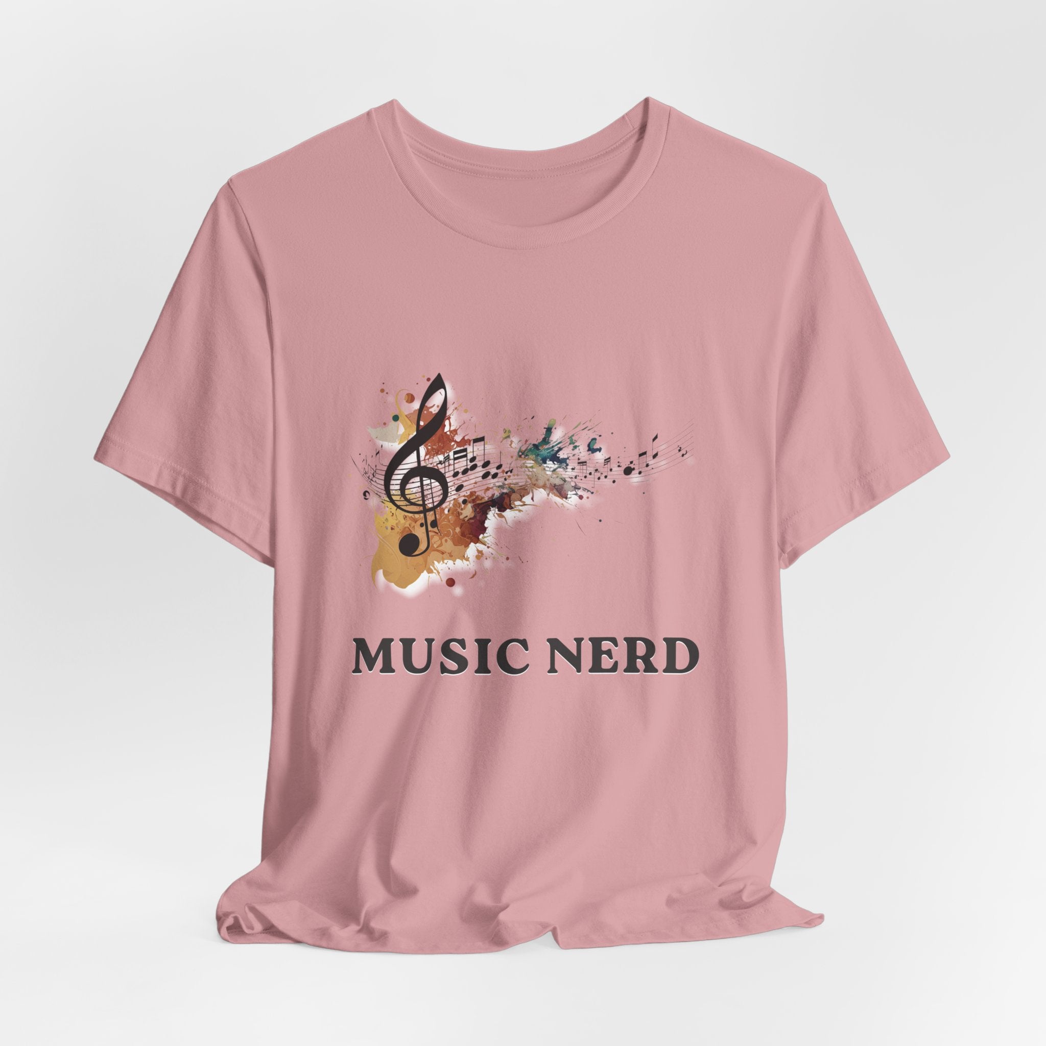 Pink t-shirt with musical design and 'MUSIC NERD' text on a white background