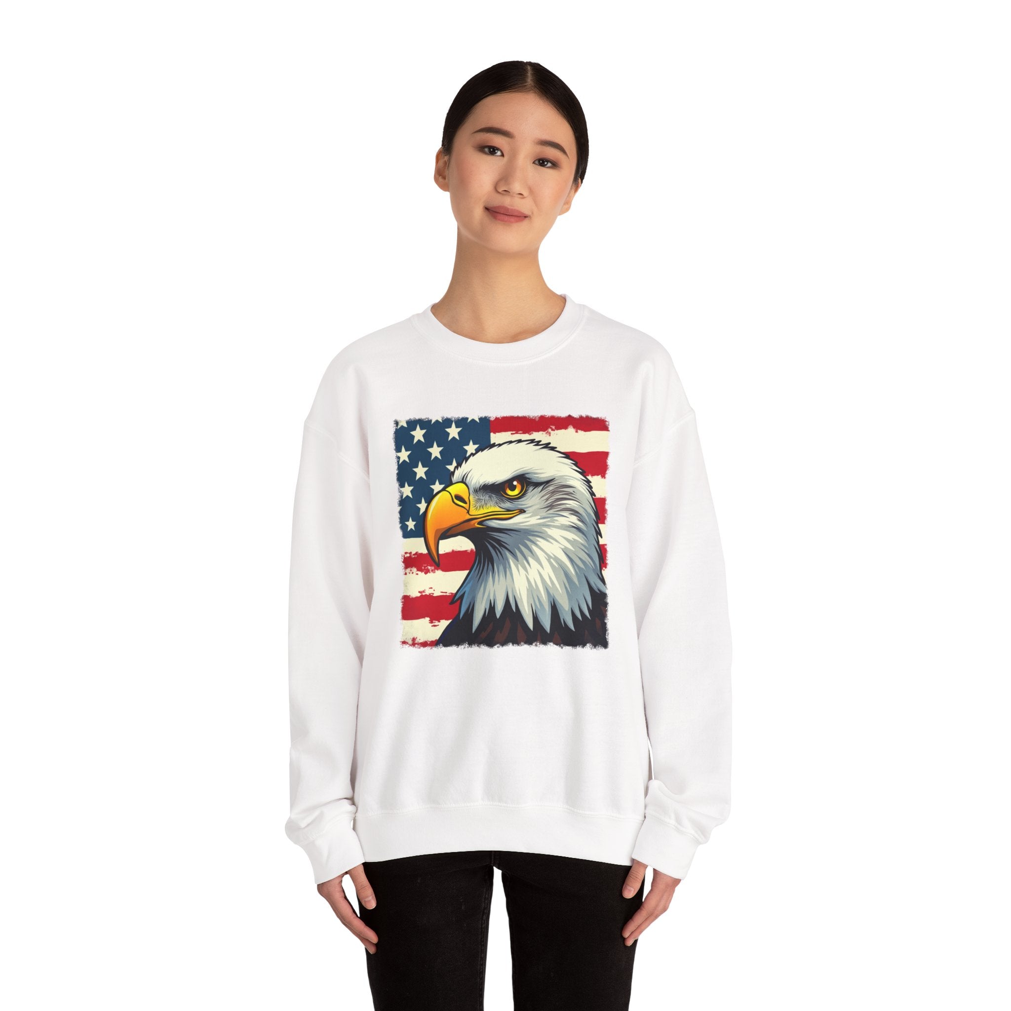 Person wearing a white sweatshirt with an eagle and American flag design on a white background