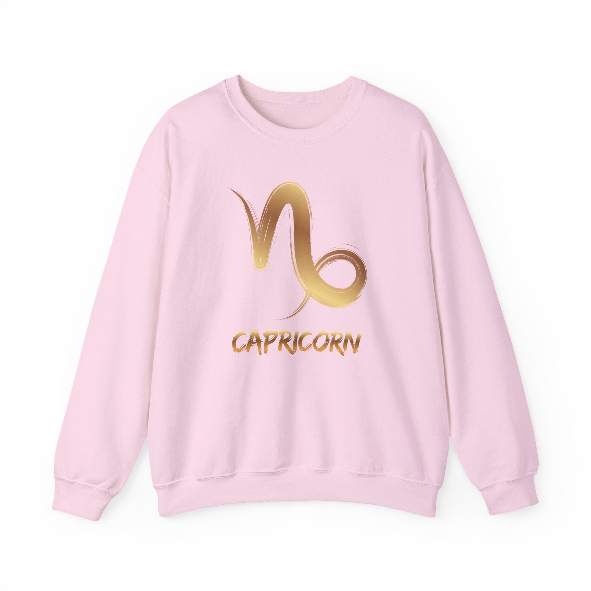 Pink sweatshirt with gold Capricorn symbol and text on a white background