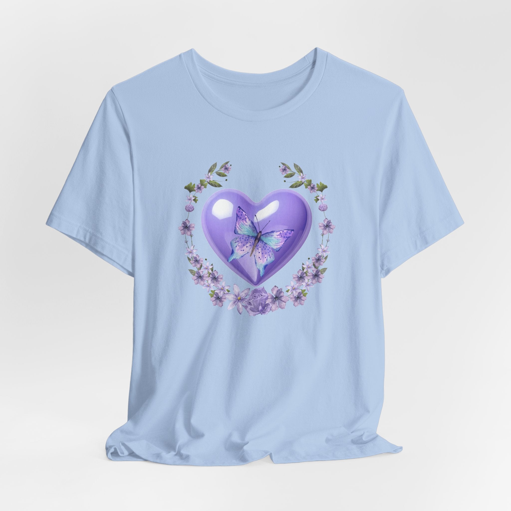 Light blue t-shirt with a purple heart and butterfly design on a light gray background