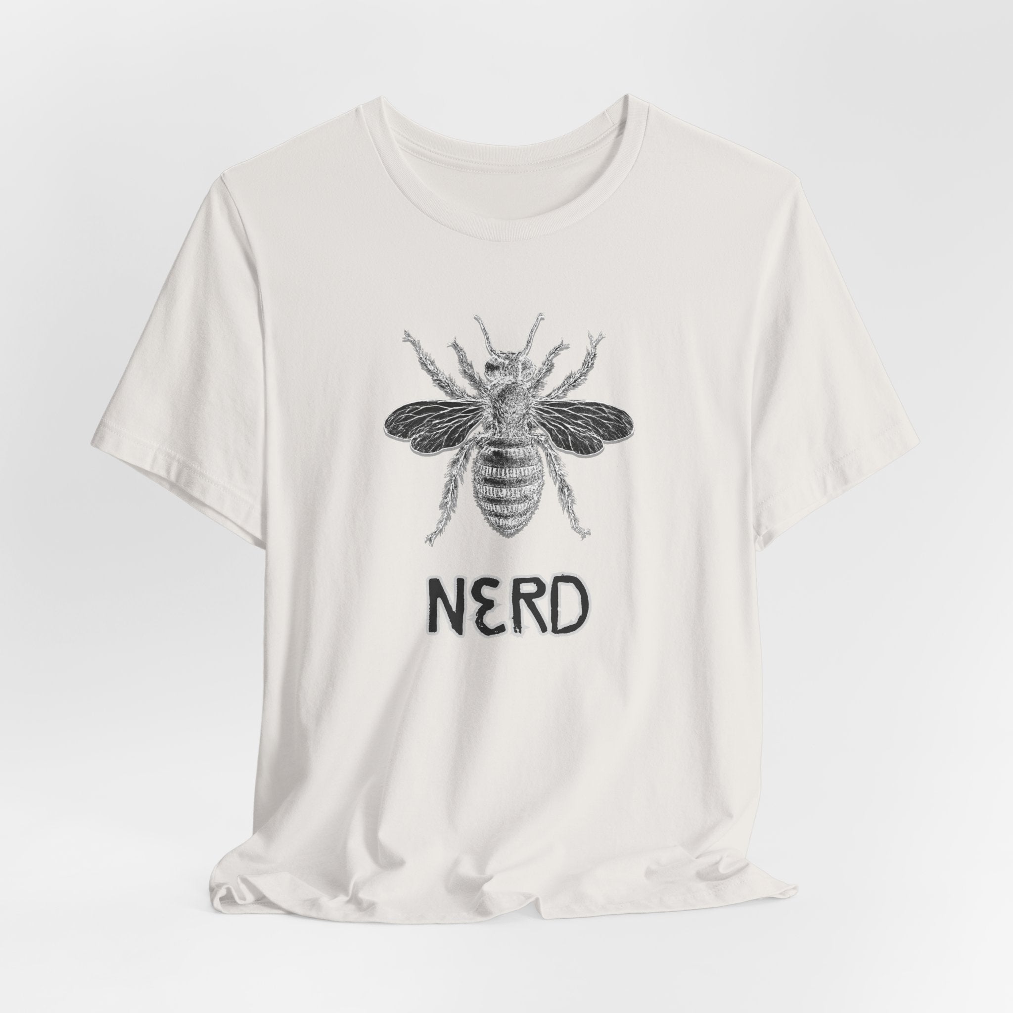 White t-shirt with a bee graphic and 'NERD' text on a white background
