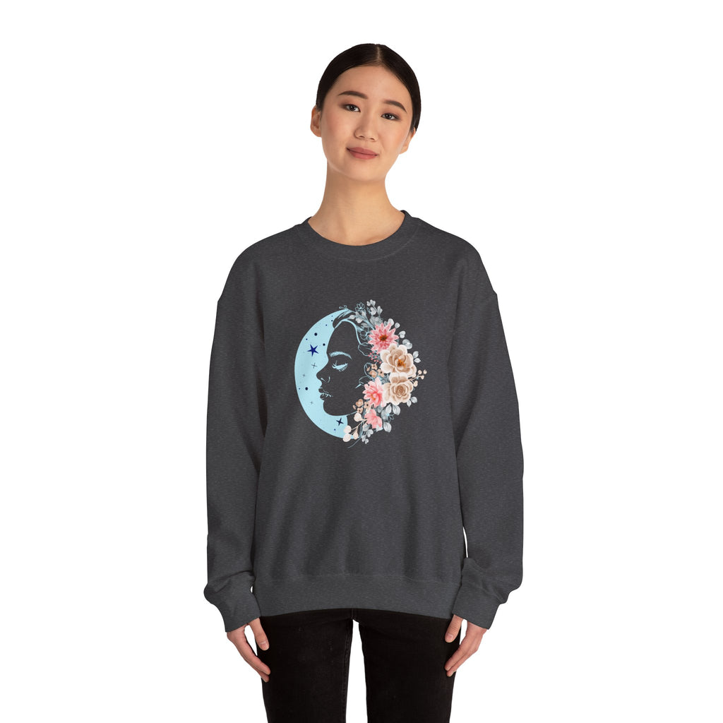 Person wearing a dark gray sweatshirt with a floral moon design on a white background