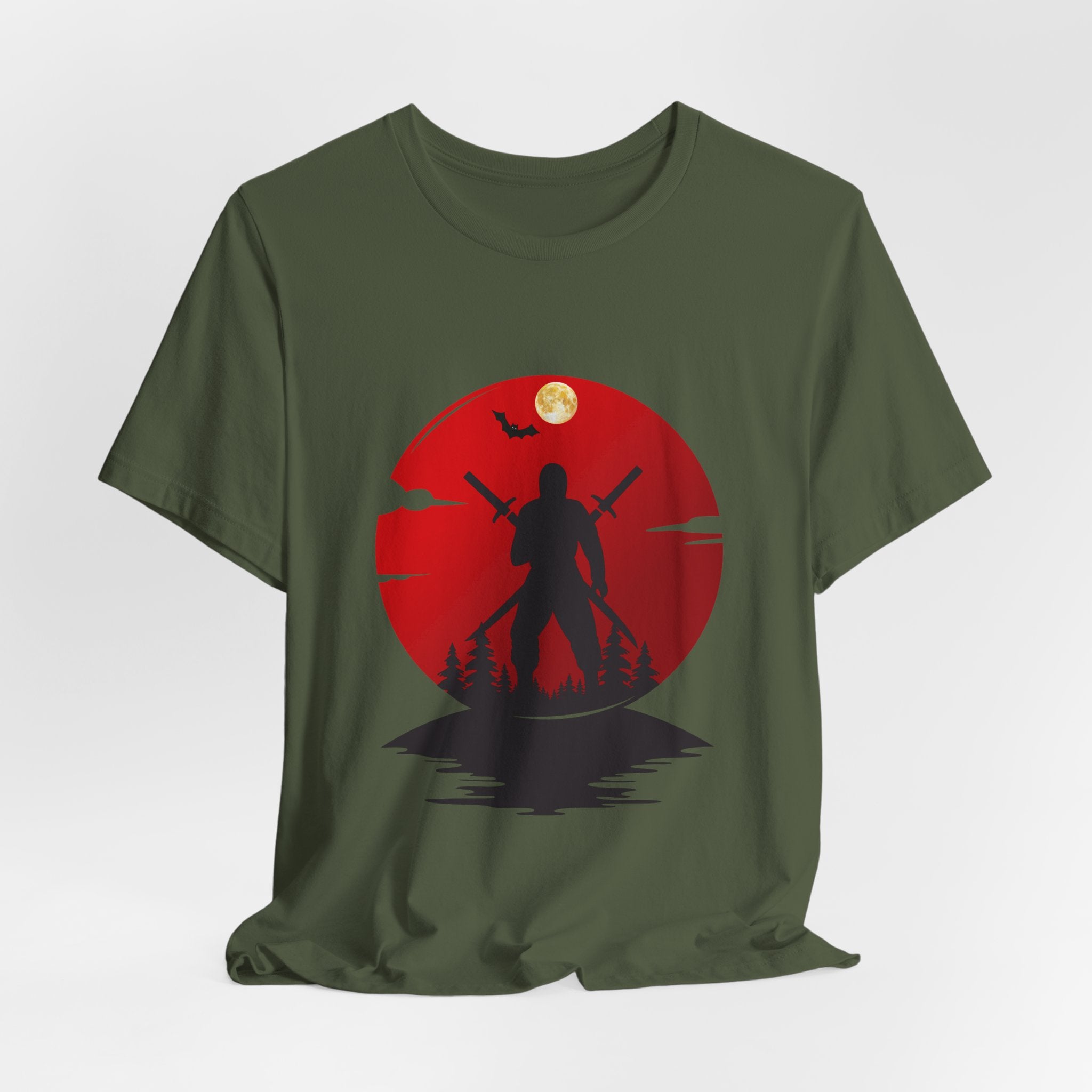 Green t-shirt with a red graphic of a silhouette holding a weapon against a moonlit sky.