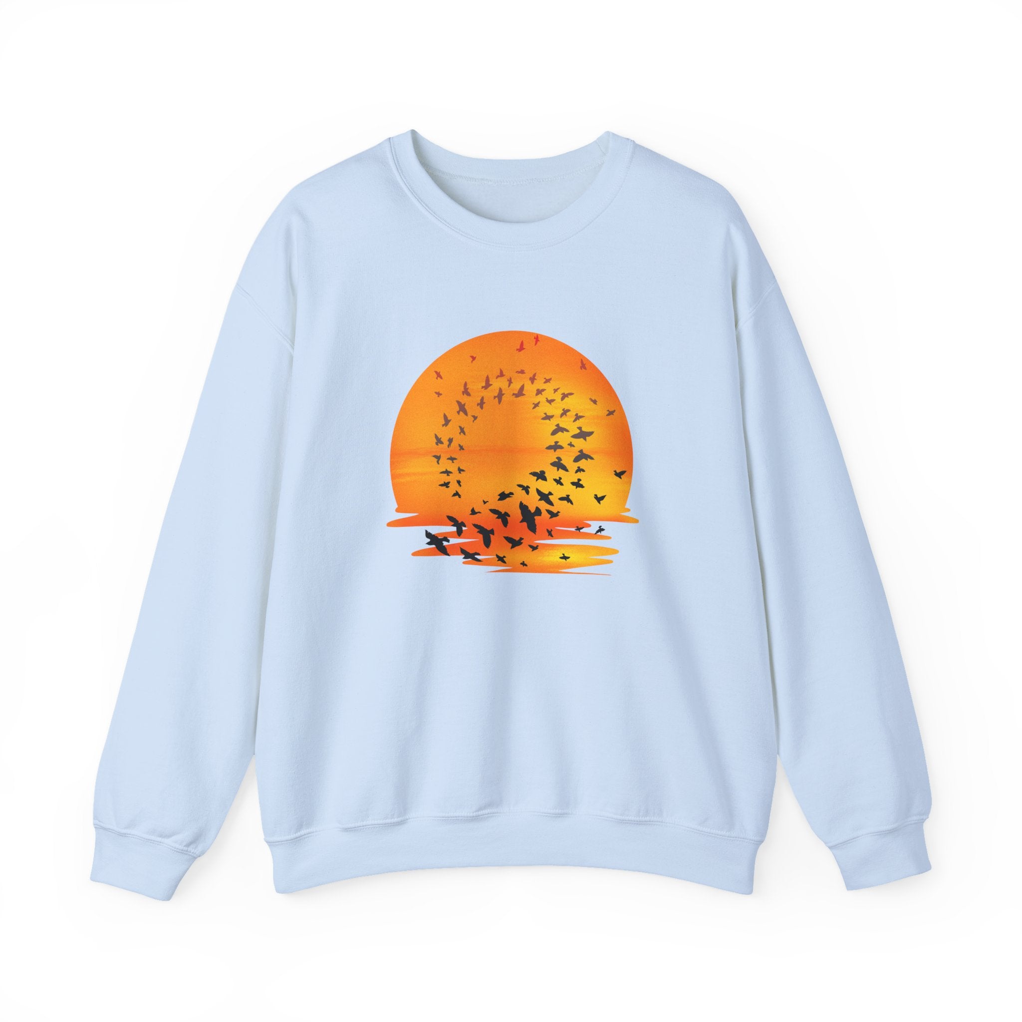 Light blue sweatshirt with a sunset and bird design on a white background