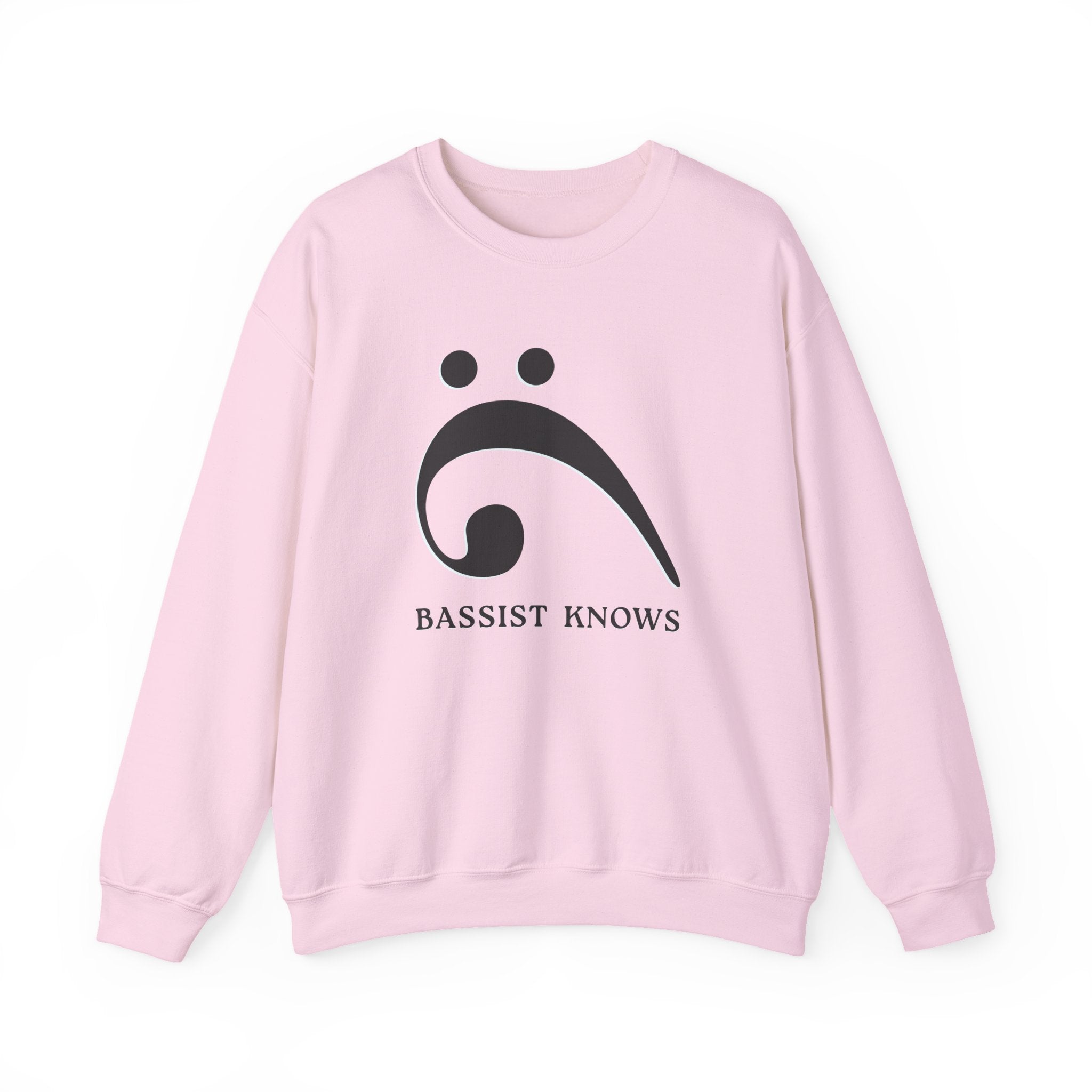 Pink sweatshirt with a black bass clef graphic and "Bassist Knows" text on a white background