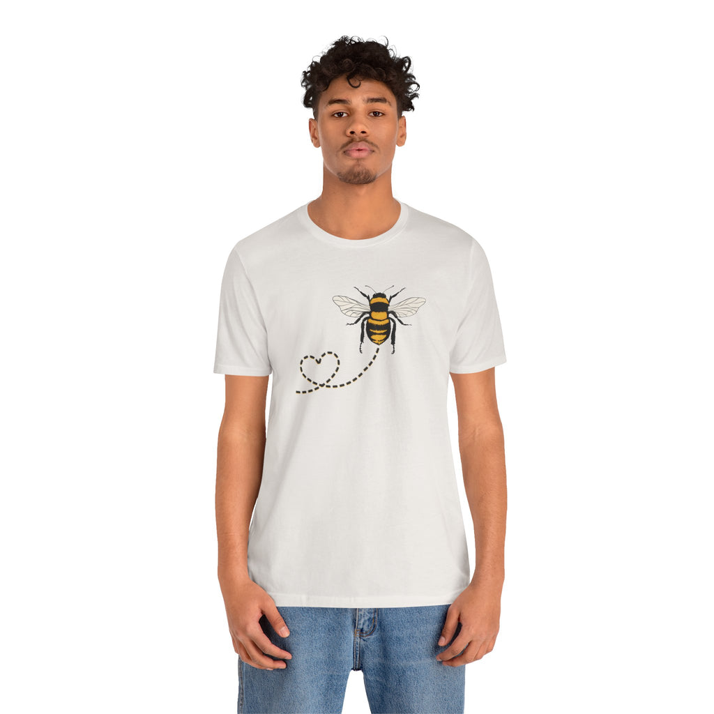 Person wearing a white t-shirt with a bee design on a white background