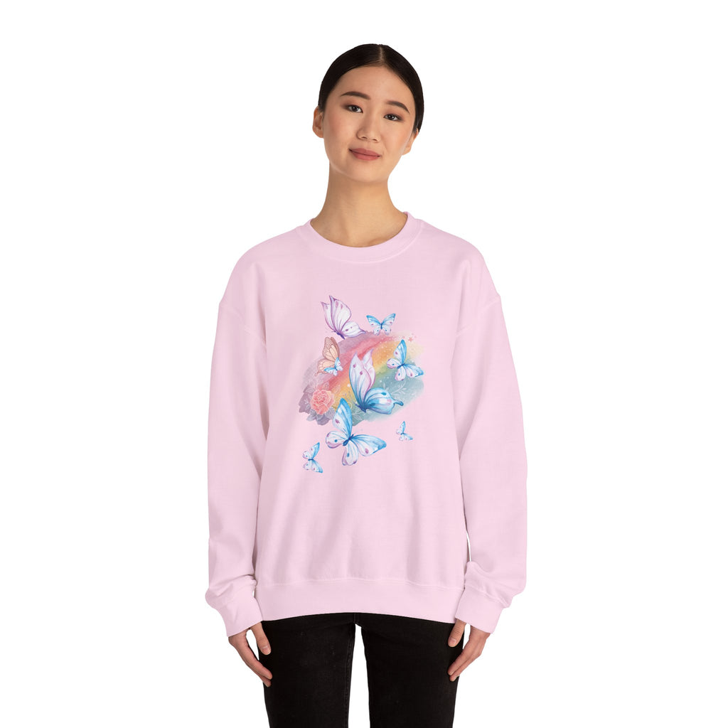 Person wearing a pink sweatshirt with butterfly designs on a white background