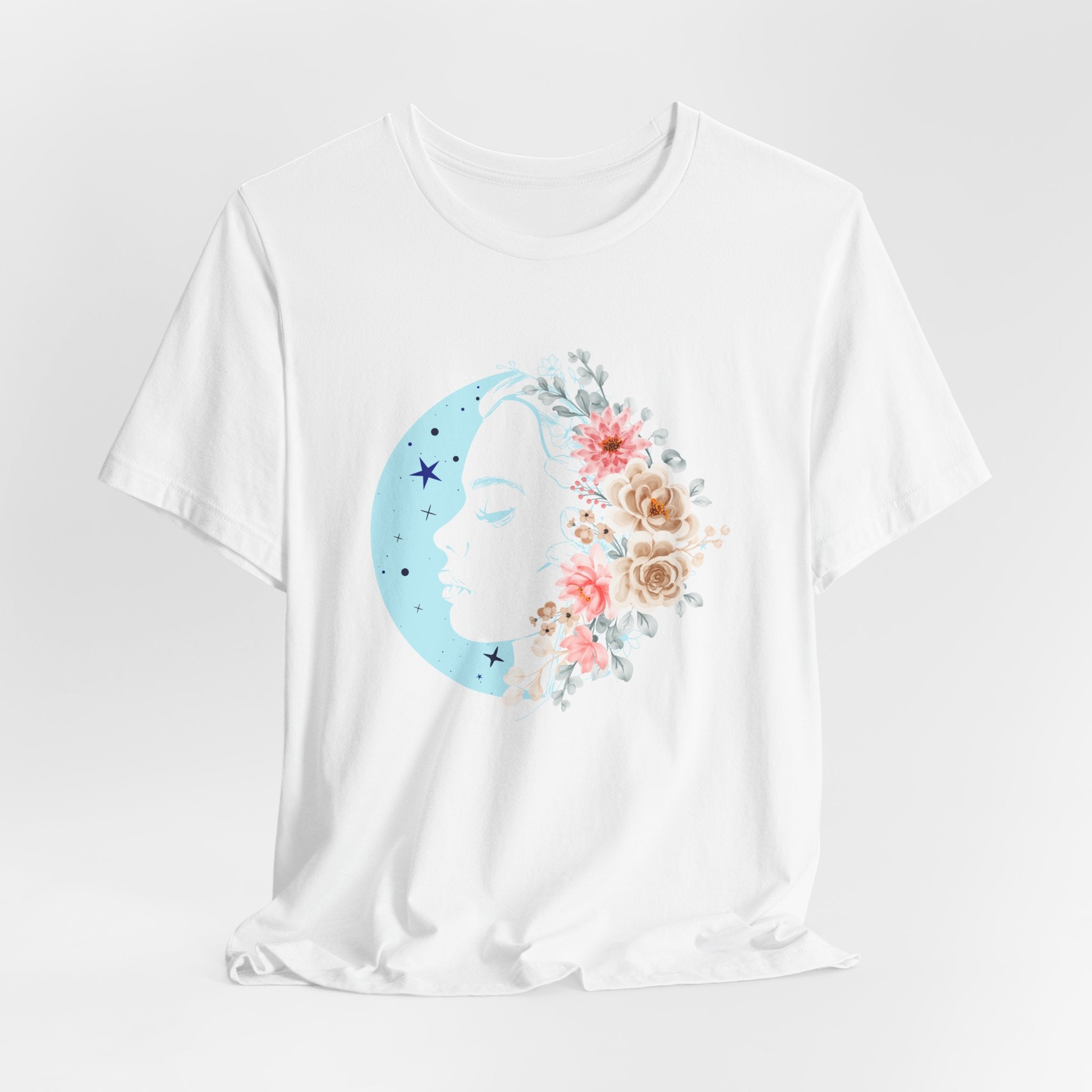 White t-shirt with a floral design featuring a moon and stars on a white background