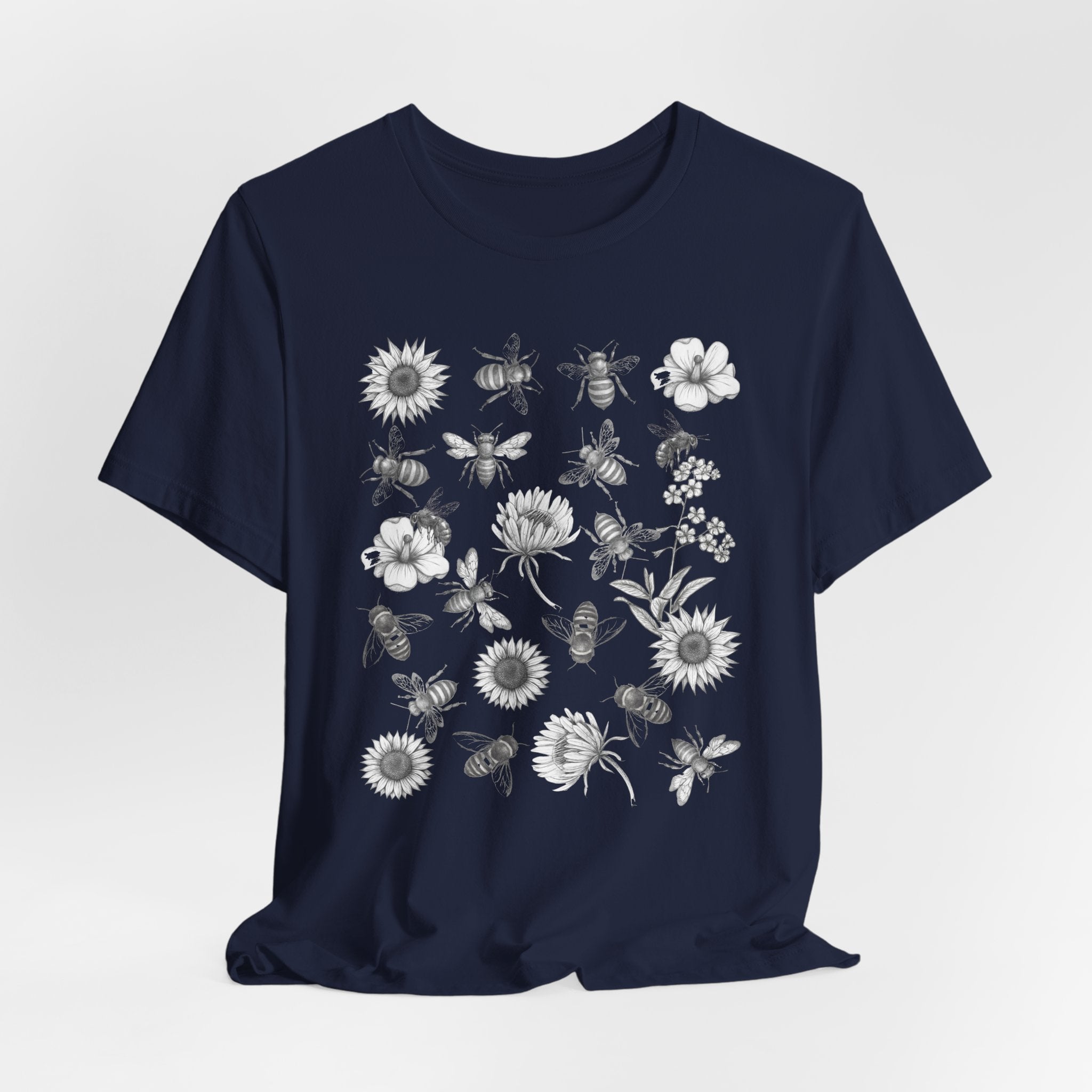 Navy blue t-shirt with white graphic design on a light gray background
