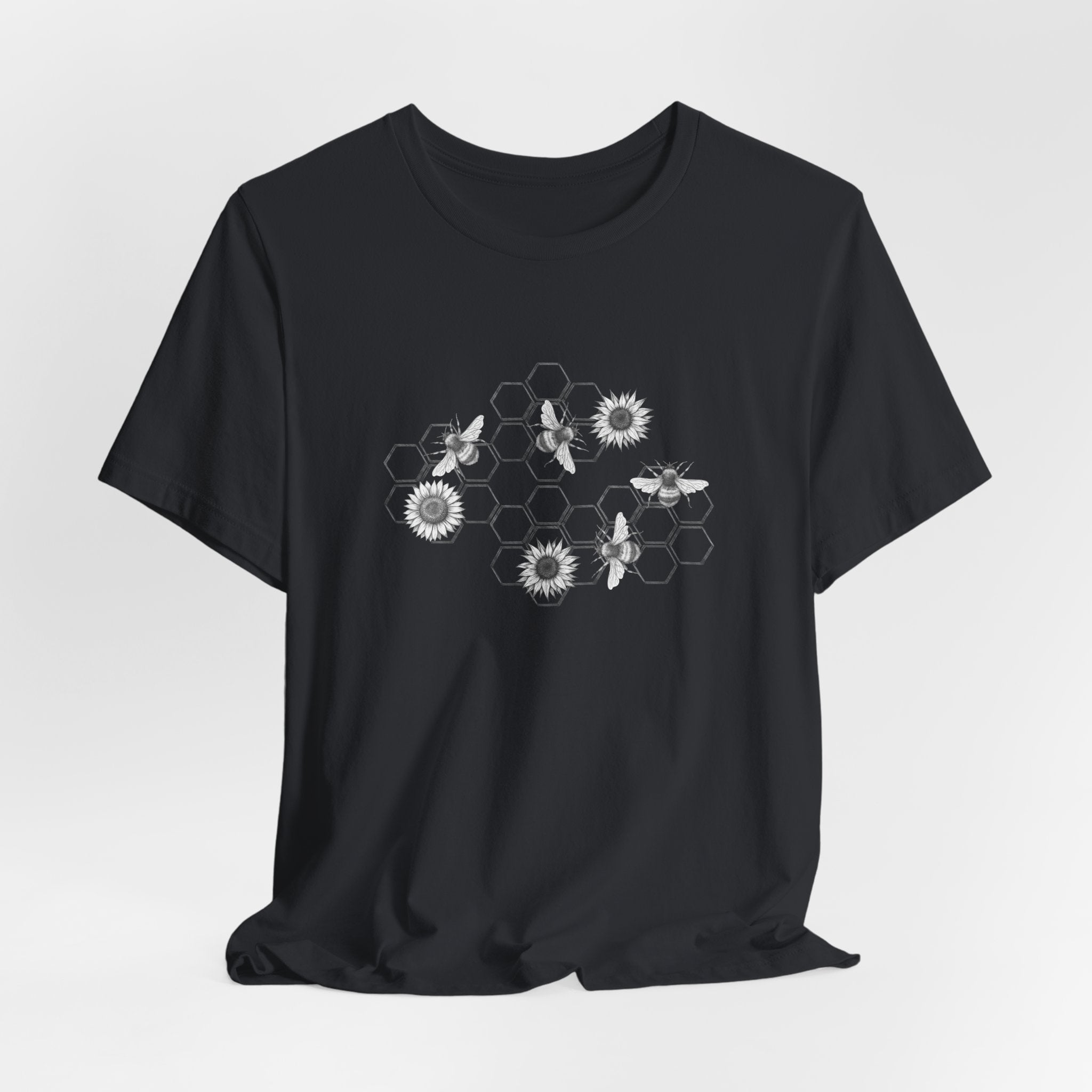 Black t-shirt with white text on a light gray background