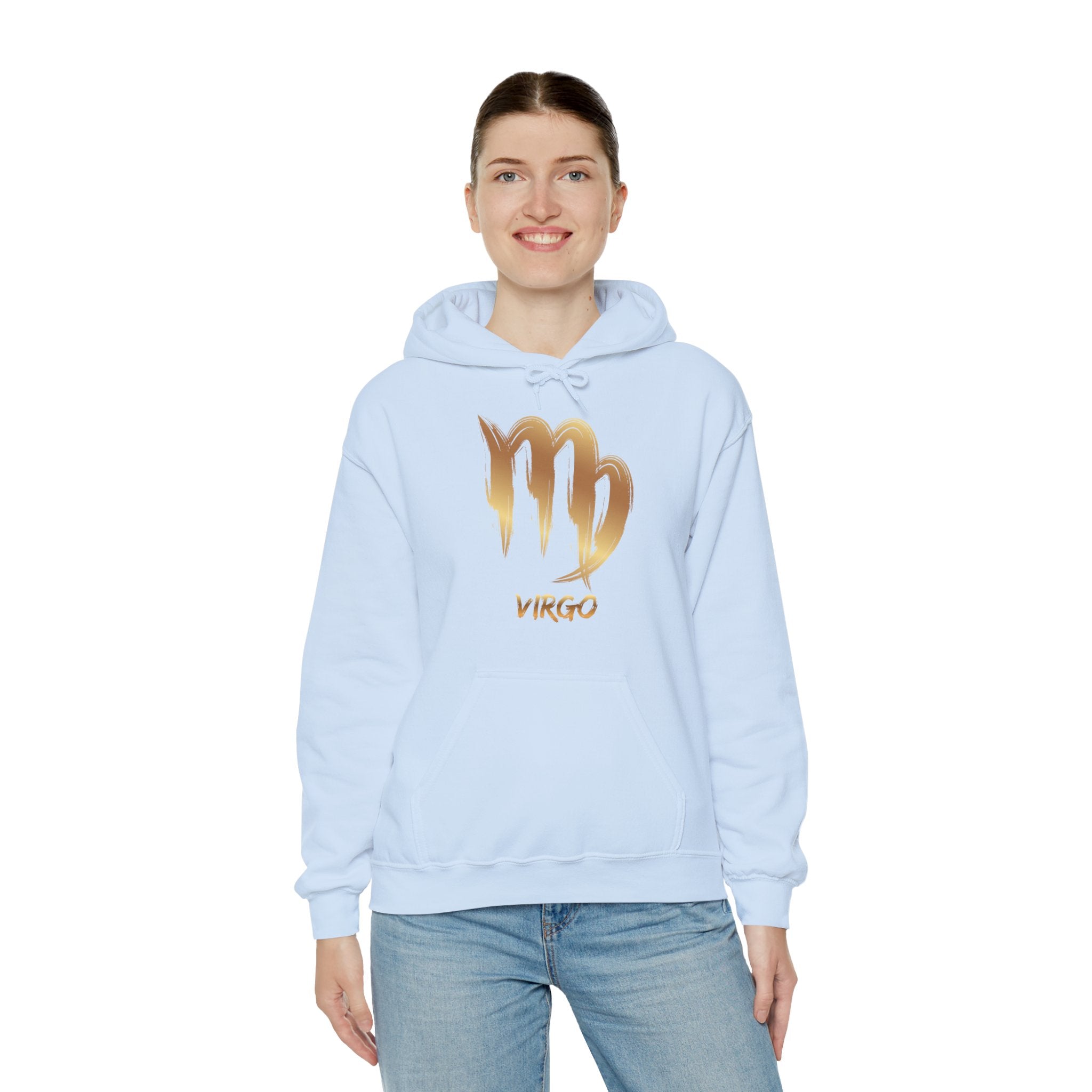 Person wearing a light blue hoodie with a gold Virgo zodiac sign design on a white background