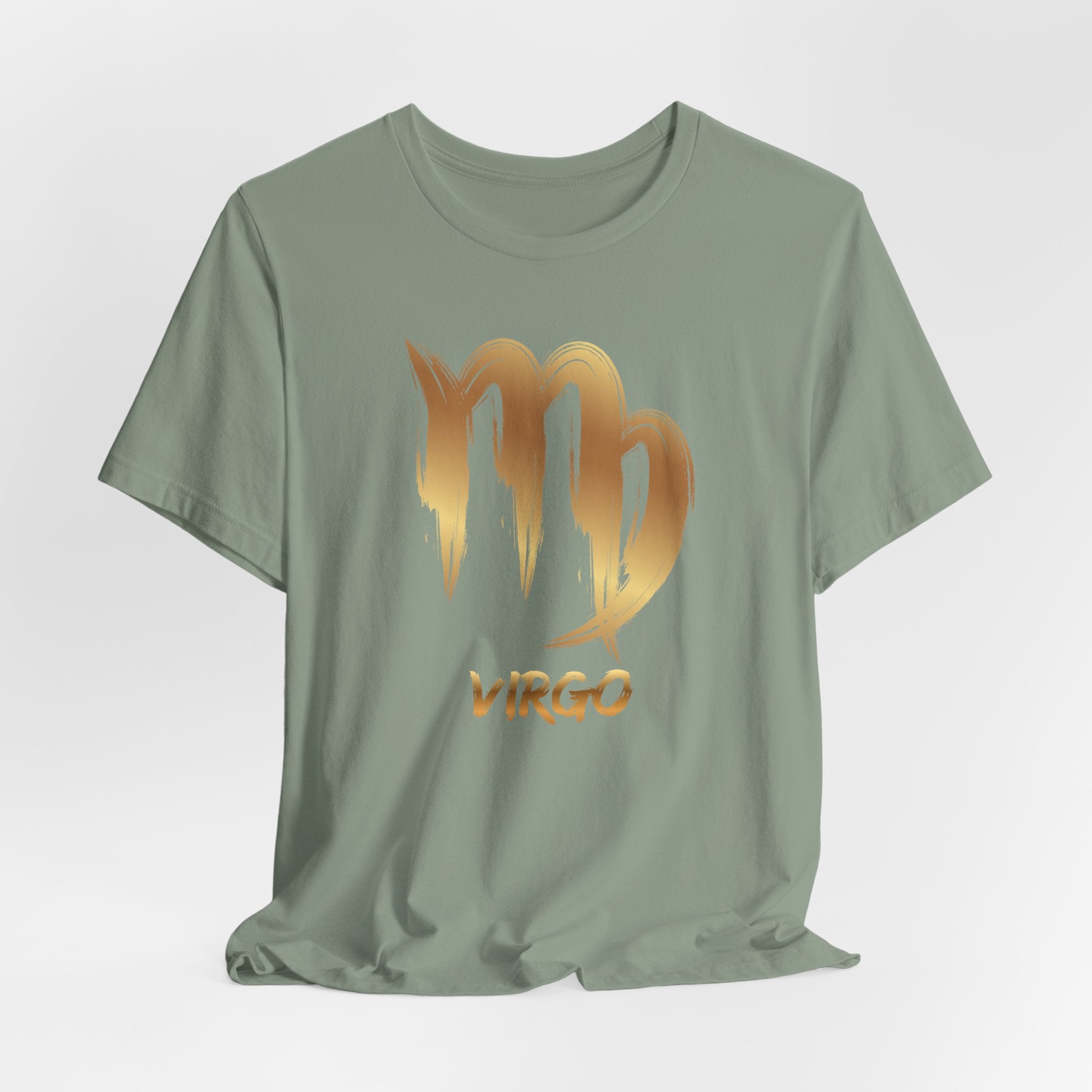 Green t-shirt with gold Virgo zodiac design on a light gray background