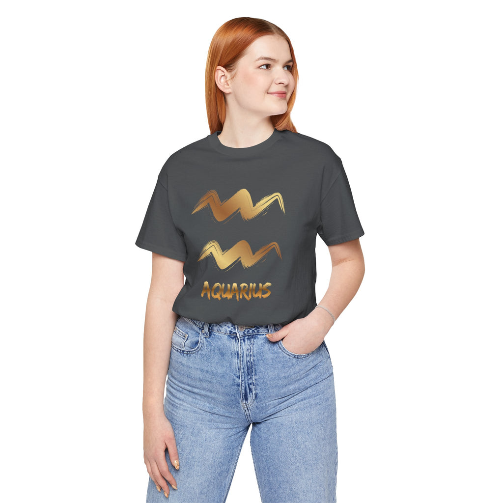 Person wearing a dark gray t-shirt with Aquarius design on a white background
