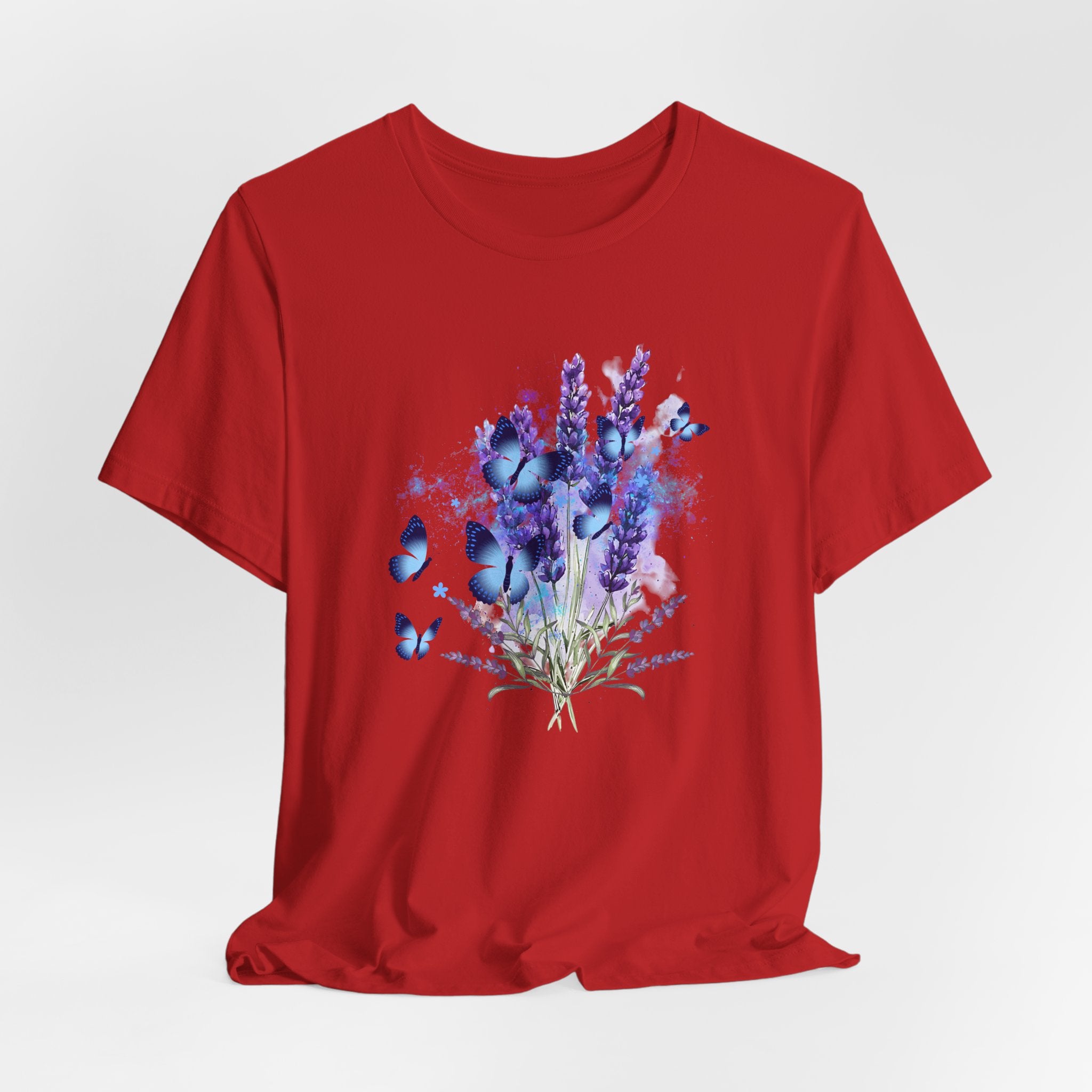 Red t-shirt with a floral and butterfly design on a white background
