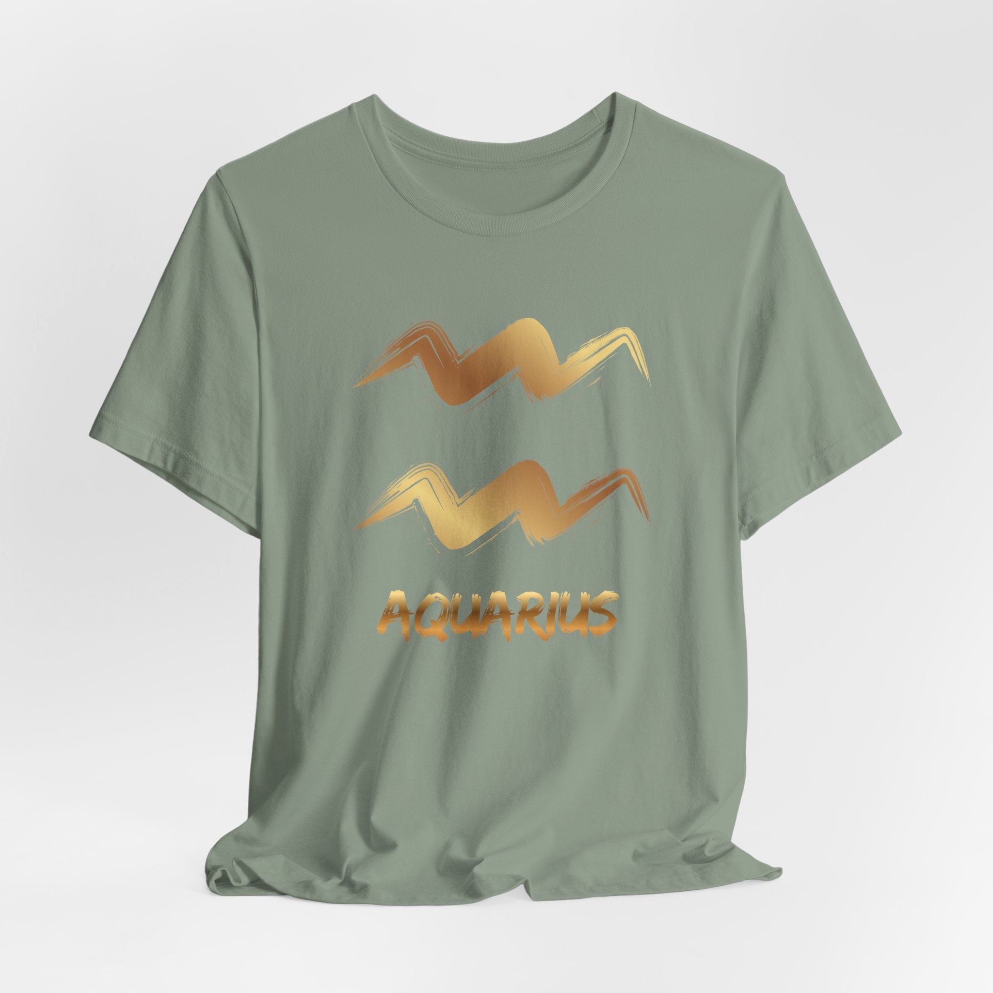 Green t-shirt with Aquarius zodiac sign design on a light gray background