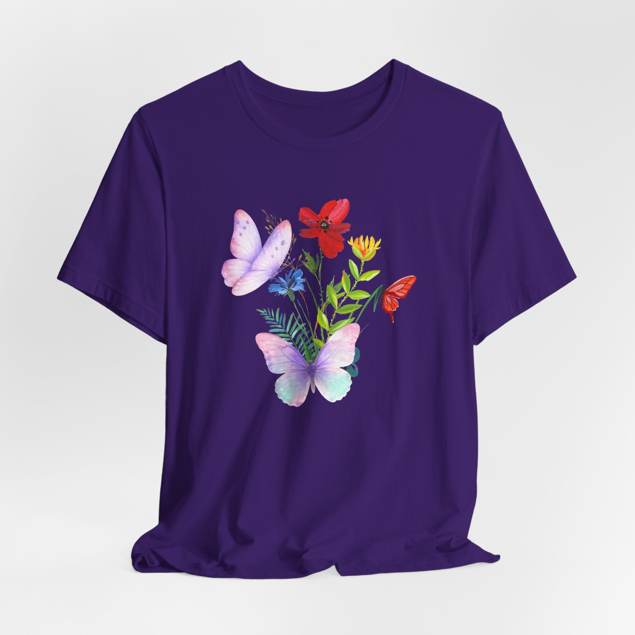 Purple t-shirt with butterfly and floral design on a white background