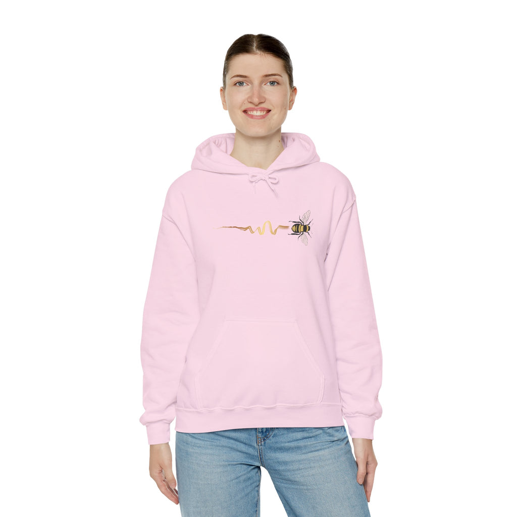 Person wearing a pink hoodie with a design on a white background