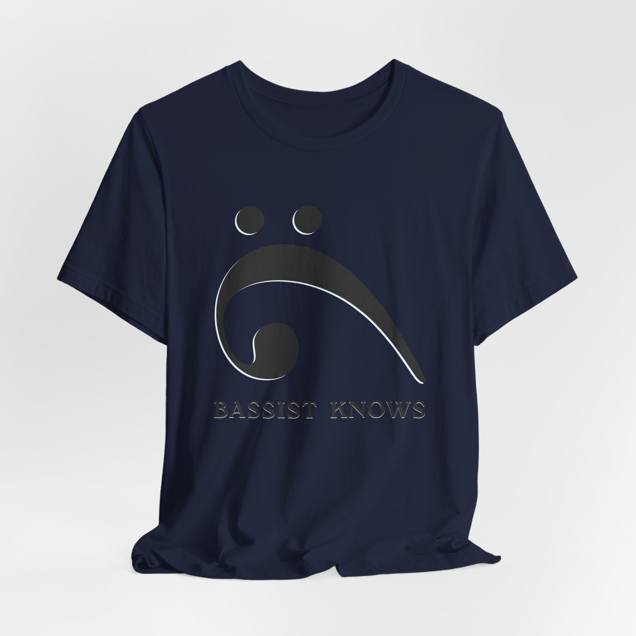 Navy blue t-shirt with black bass clef and 'Bassist Knows' text on a light gray background