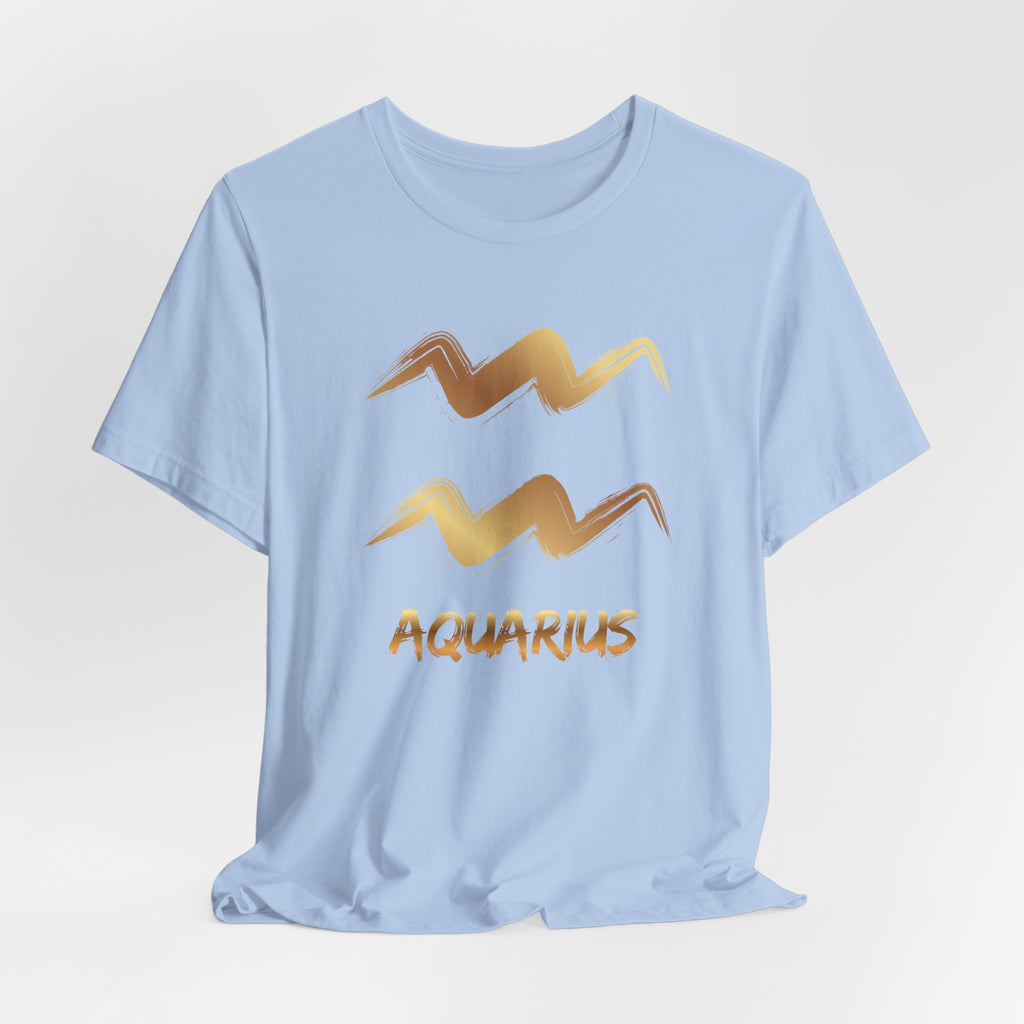 Light blue t-shirt with gold Aquarius zodiac sign design on a light gray background