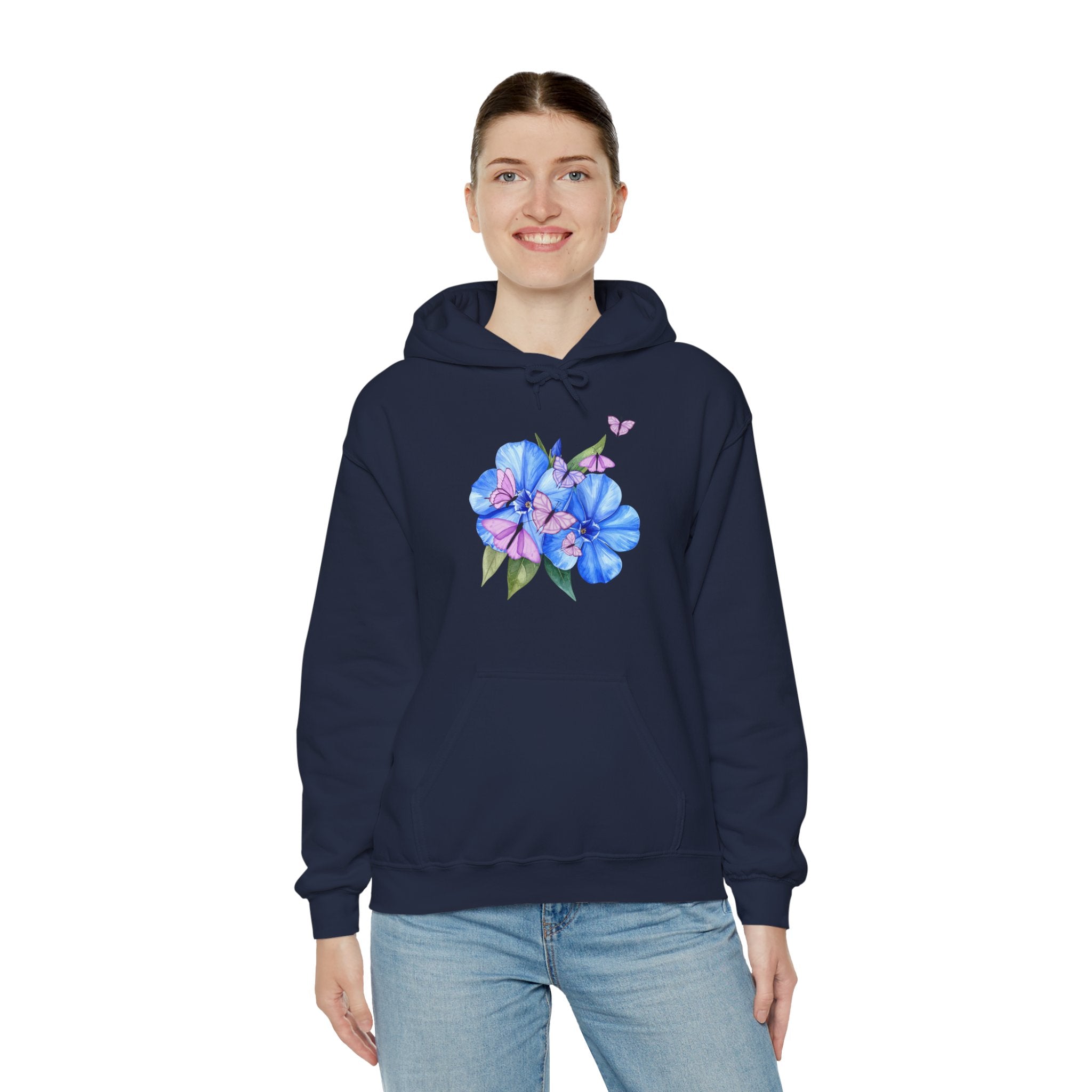 Person wearing a navy hoodie with a floral design on a white background