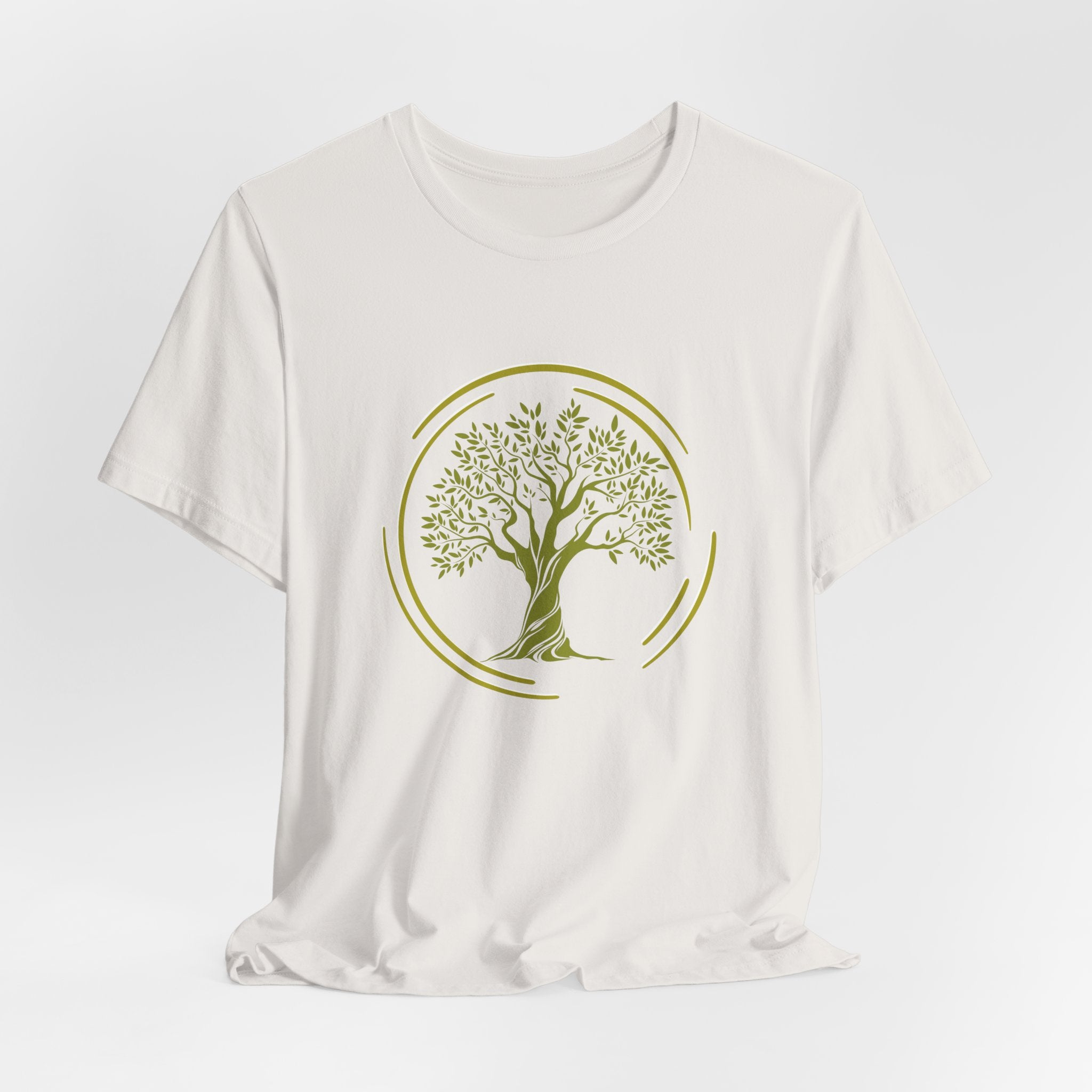 White t-shirt with a green tree design on a white background