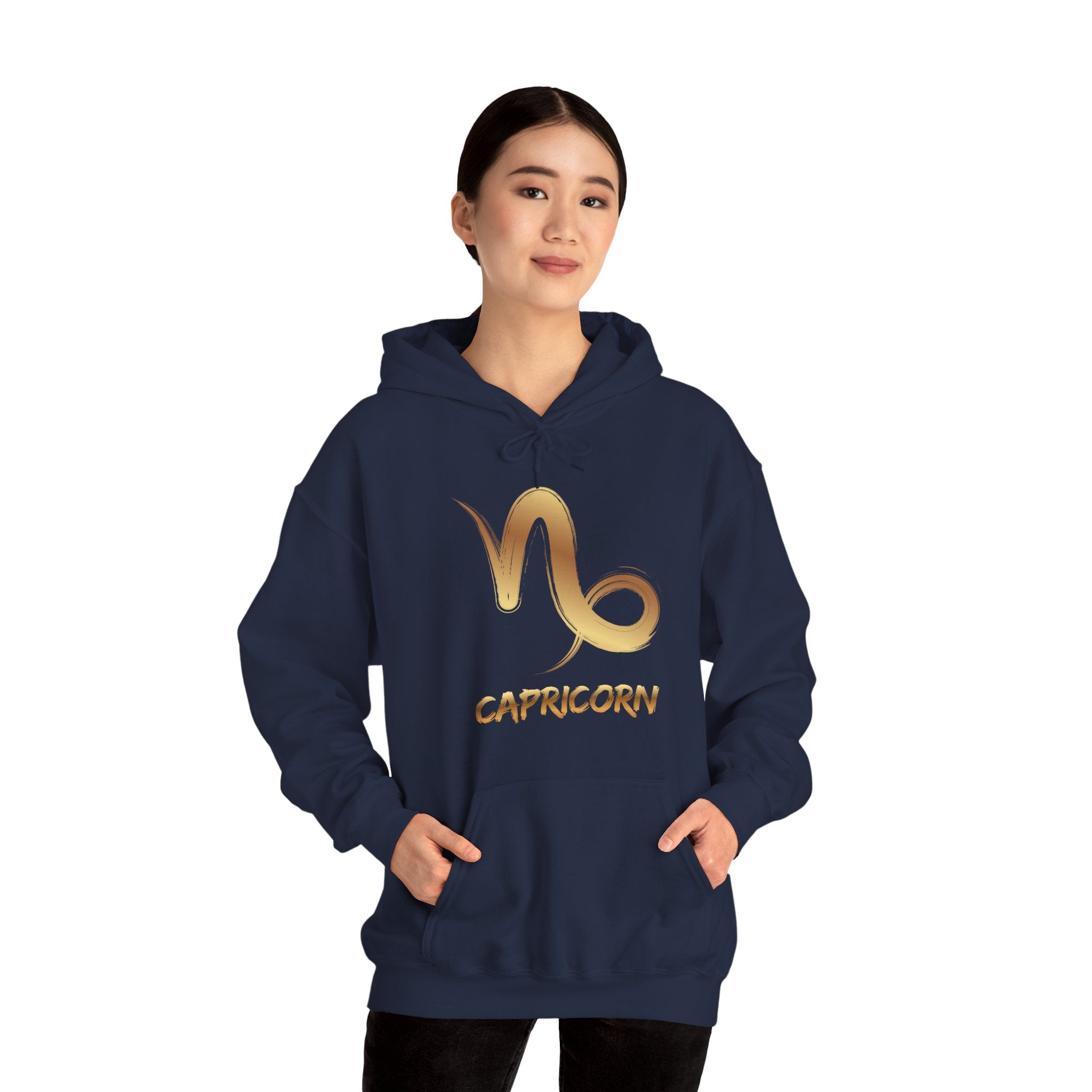 Person wearing a navy blue hoodie with a graphic design on a white background