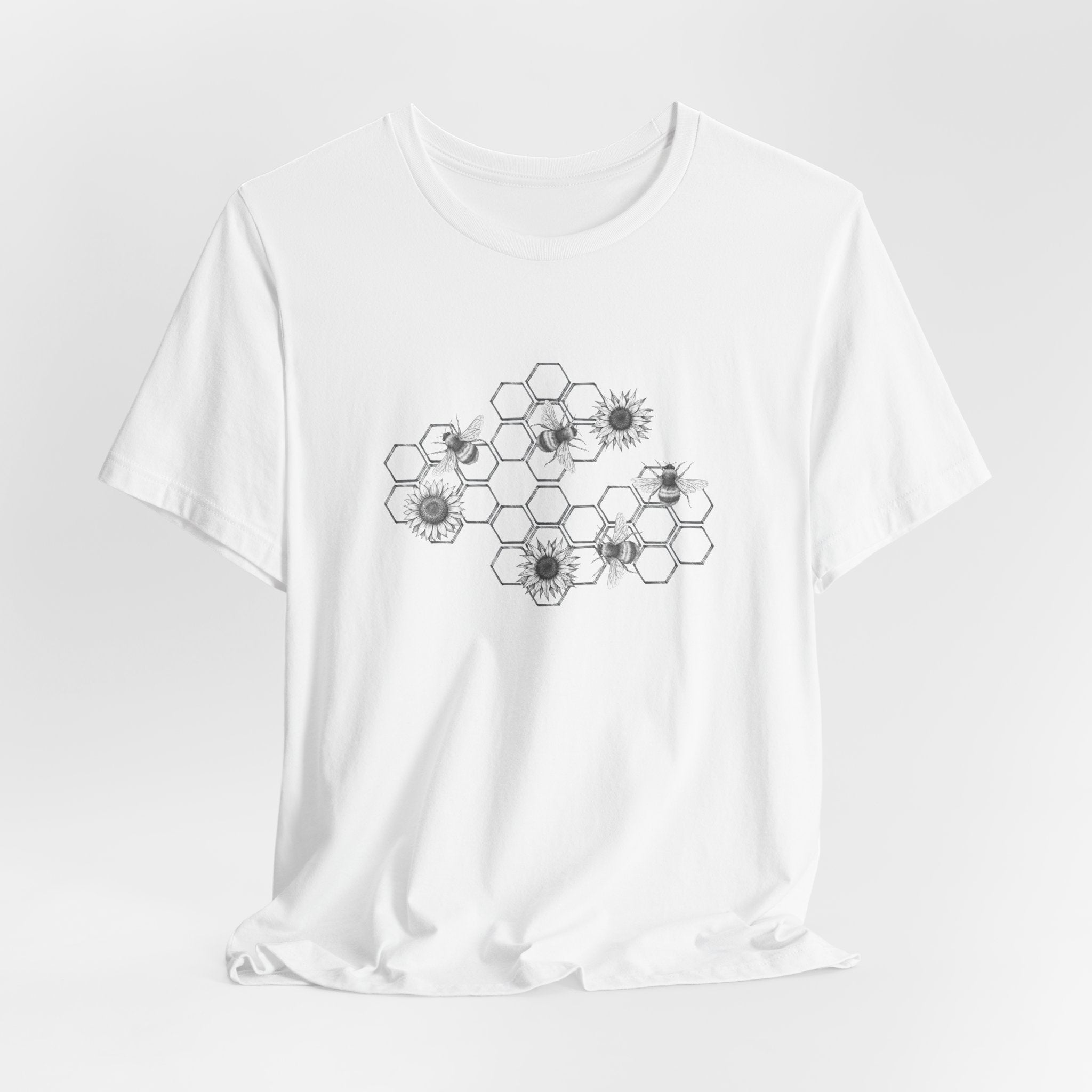 White t-shirt with black geometric flower pattern on a white background