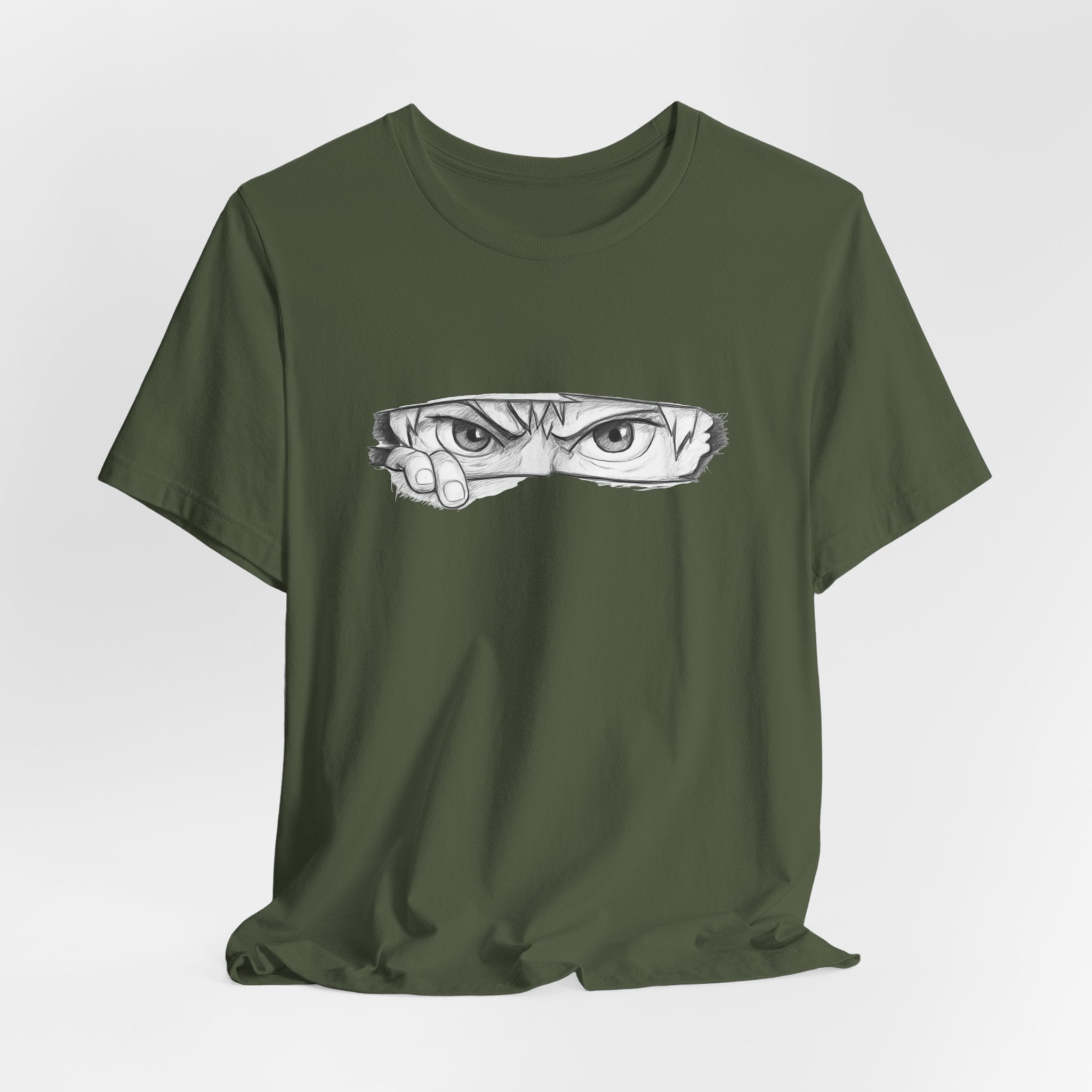 Green t-shirt with a graphic of eyes on a white background