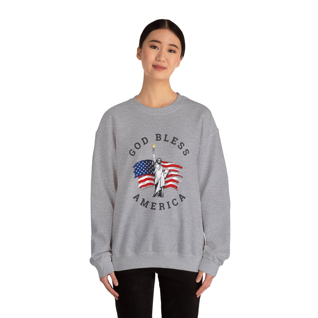 Person wearing a gray sweatshirt with 'God Bless America' graphic on a white background
