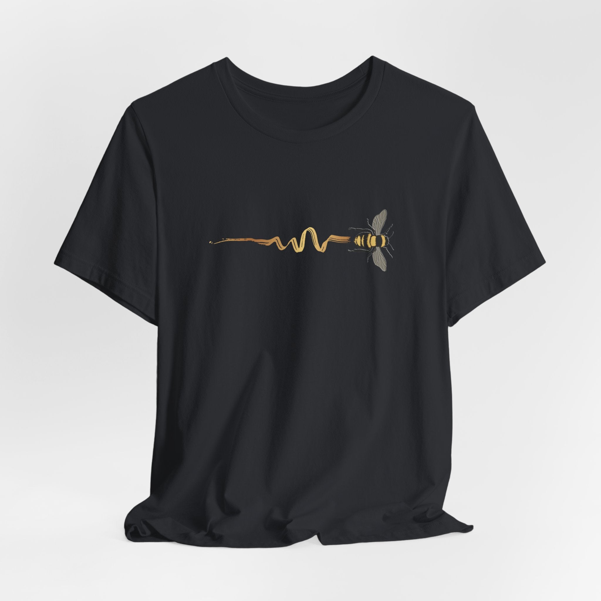 Black t-shirt with a bee and pulse line design on a light gray background