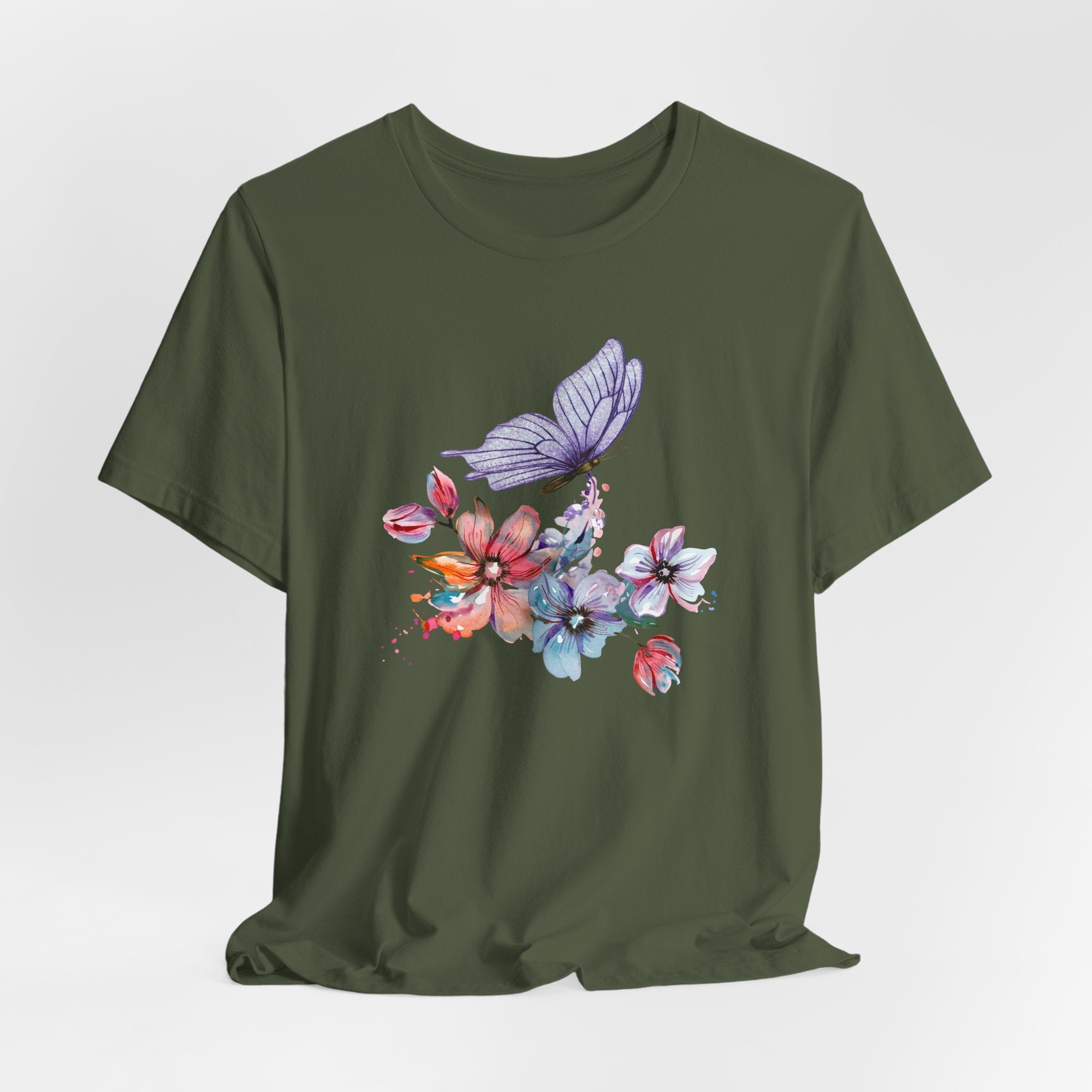 Green t-shirt with a colorful butterfly and floral design on a white background