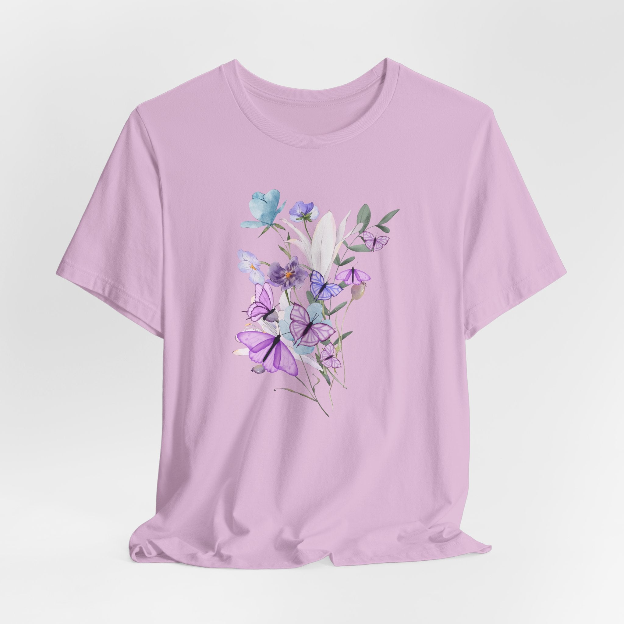 Lavender t-shirt with floral design on a light gray background