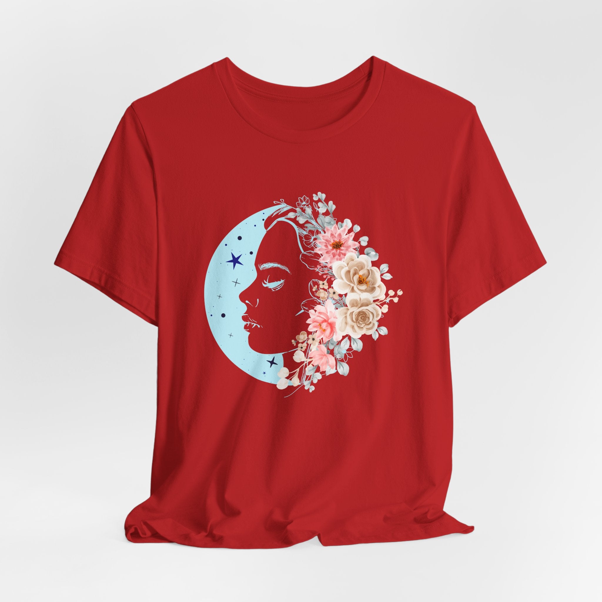 Red t-shirt with a floral and moon design on a white background