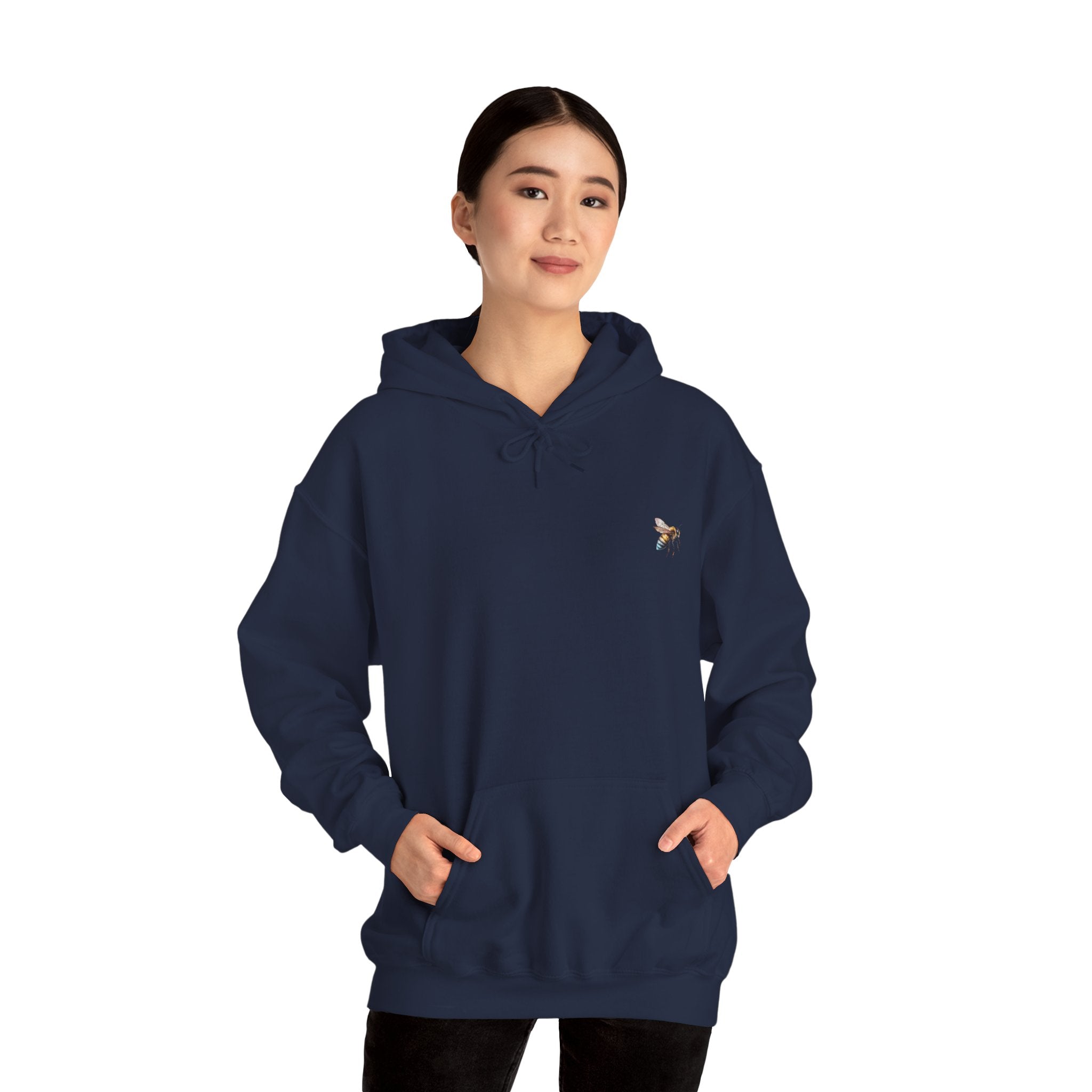 Person wearing a navy blue hoodie on a white background