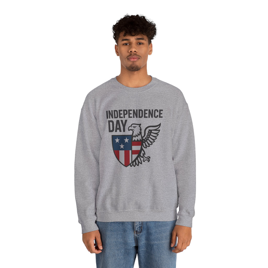 Person wearing a gray sweatshirt with 'Independence Day' and an eagle design on a white background