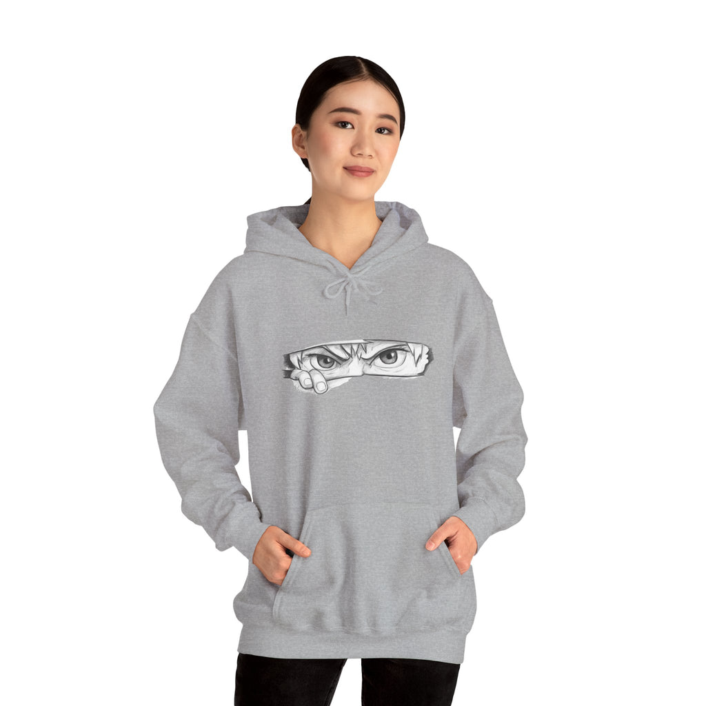 Person wearing a gray hoodie on a white background