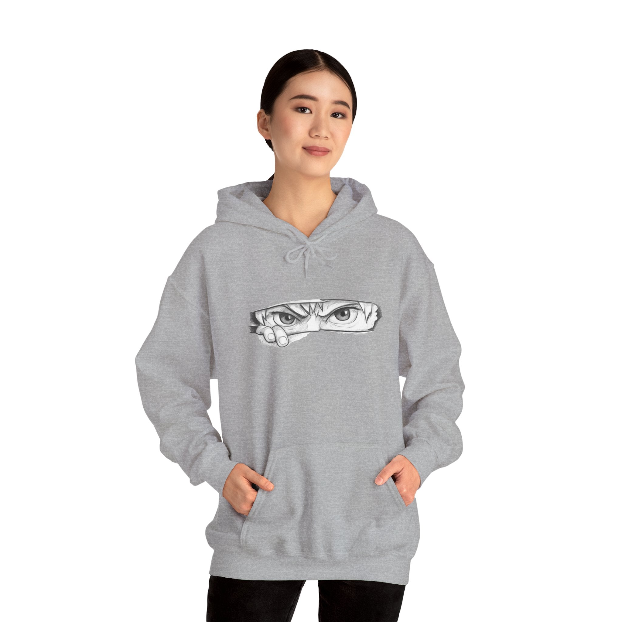 Person wearing a gray hoodie on a white background
