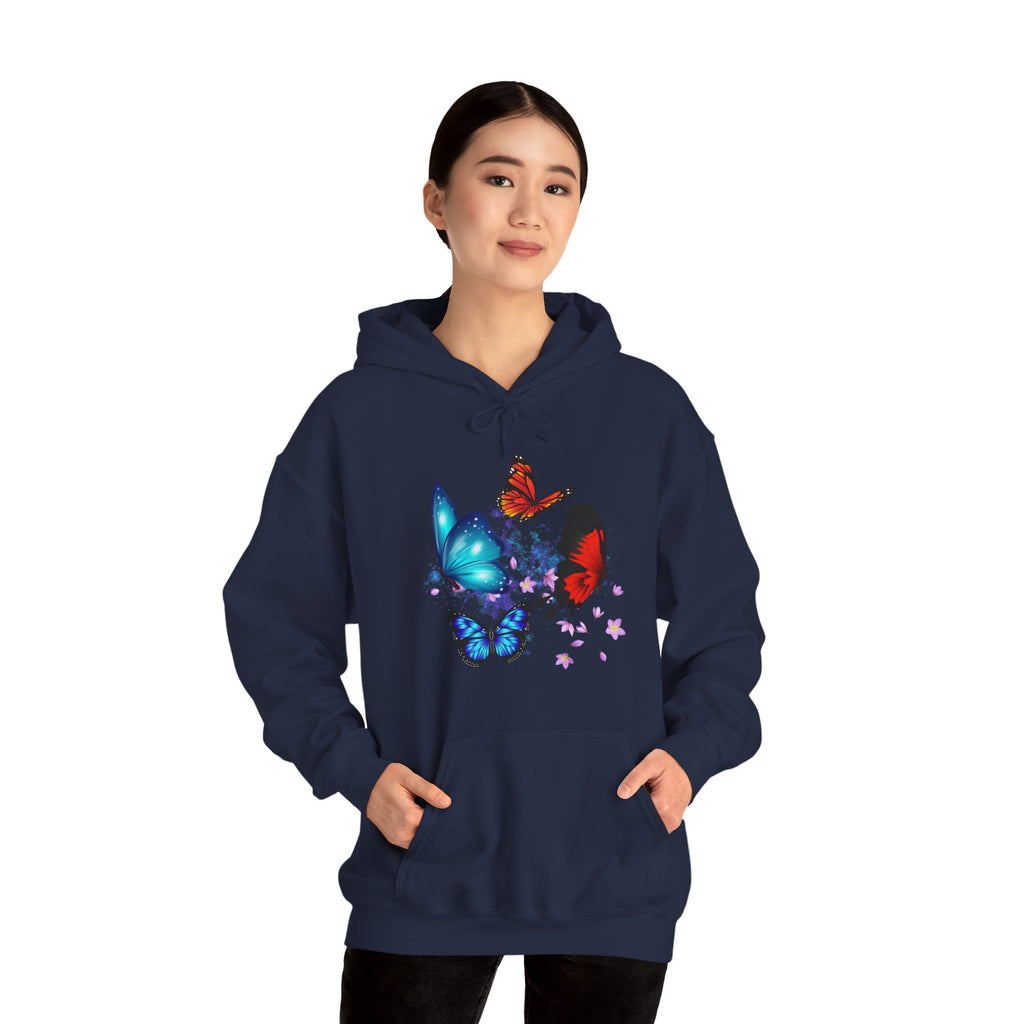 Person wearing a navy blue hoodie with butterfly designs on a white background