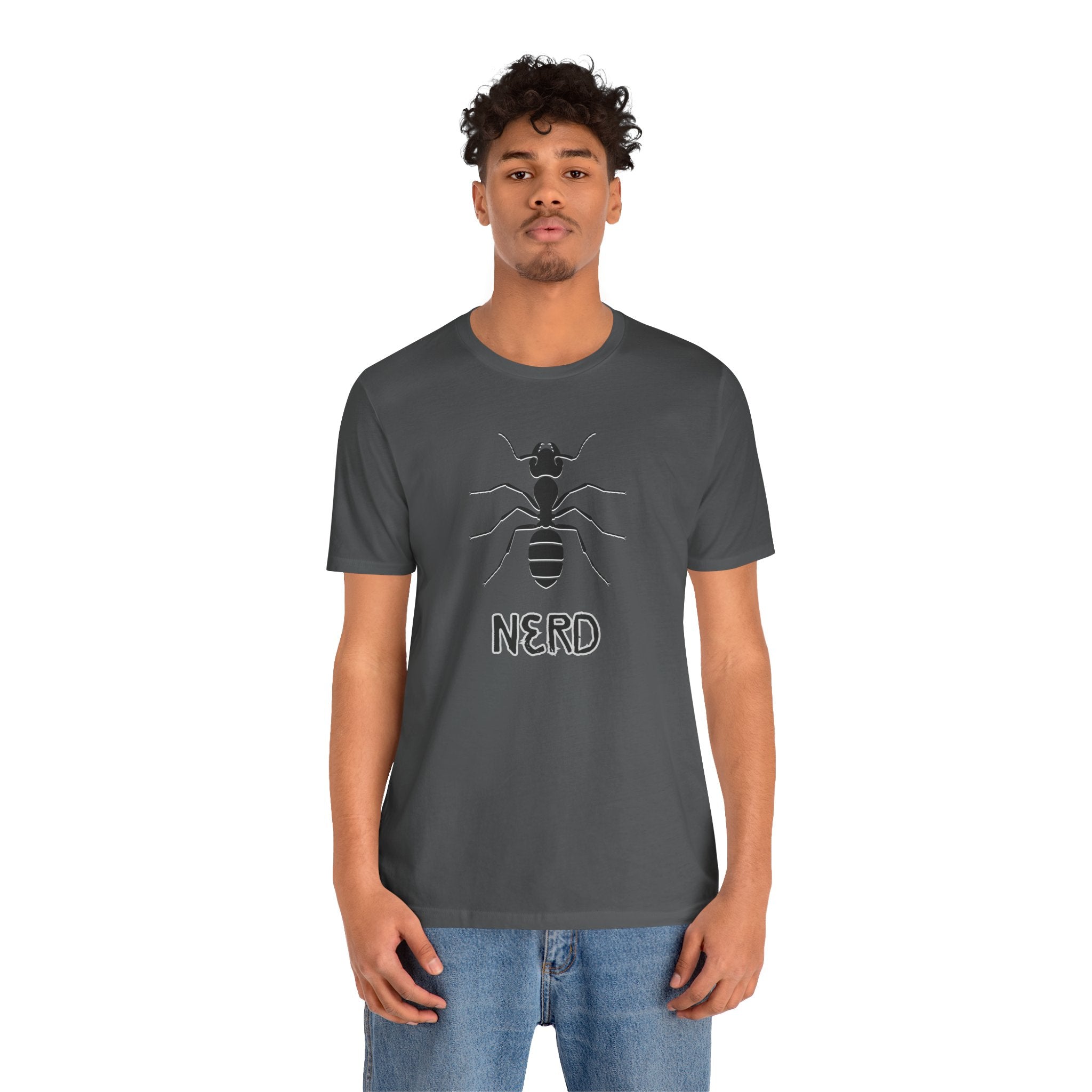 Person wearing a dark gray t-shirt with a graphic design on a white background