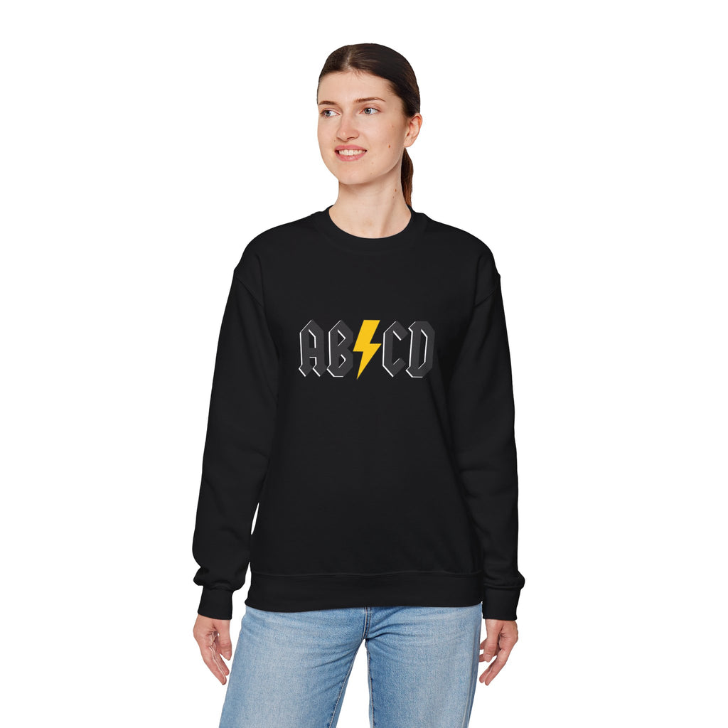 Person wearing a black sweatshirt with 'ABCD' logo featuring a lightning bolt on a white background