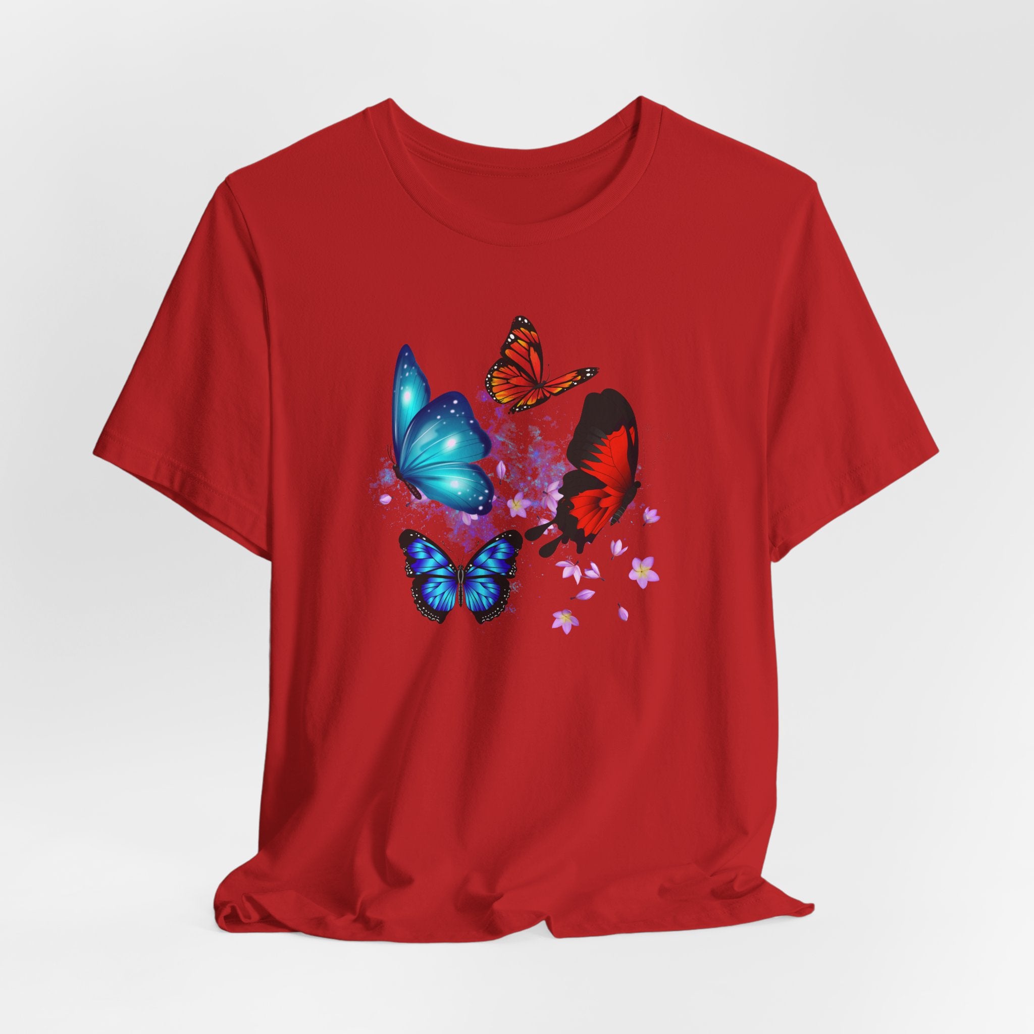 Red t-shirt with colorful butterfly design on a white background