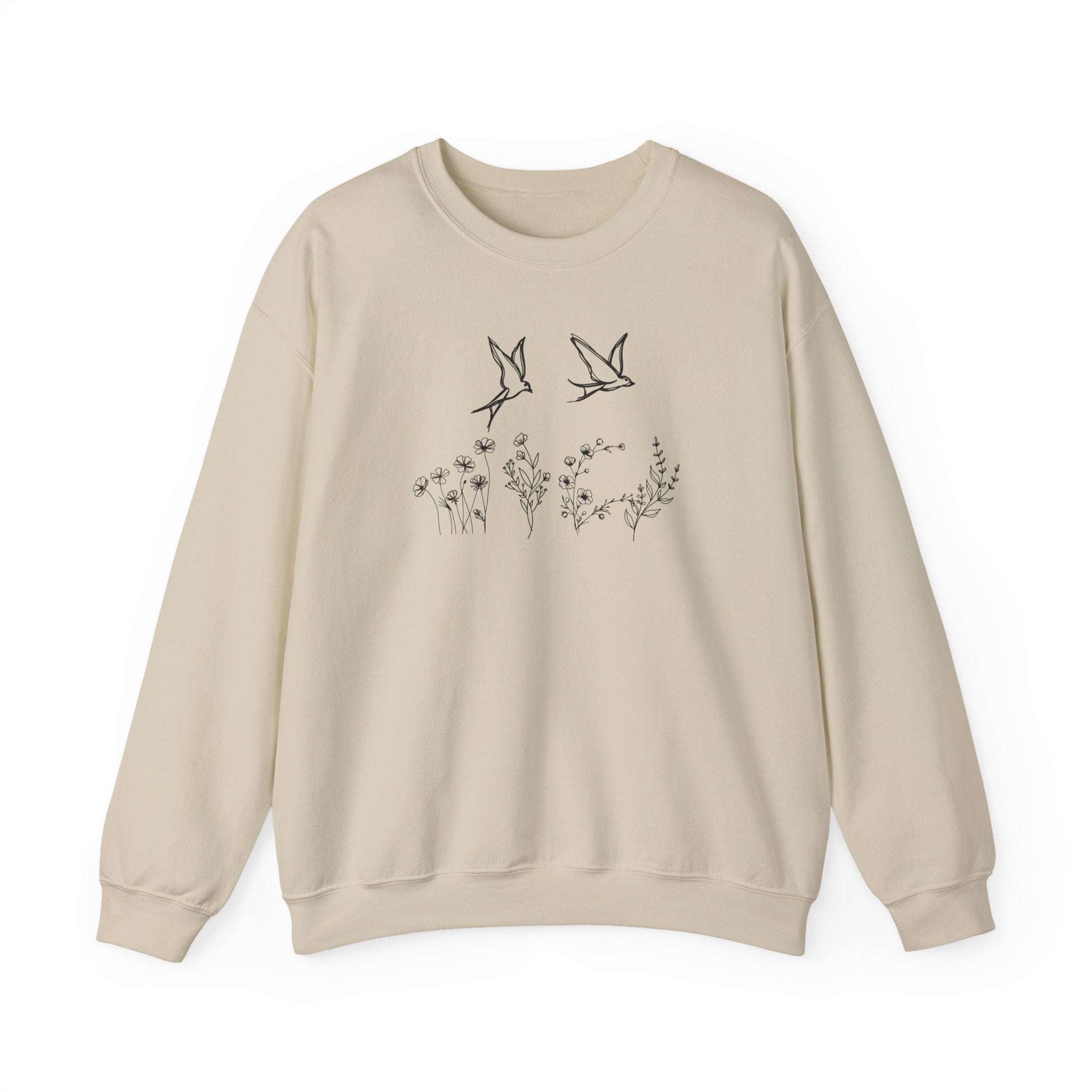 Beige sweatshirt with bird and flower graphics on a white background