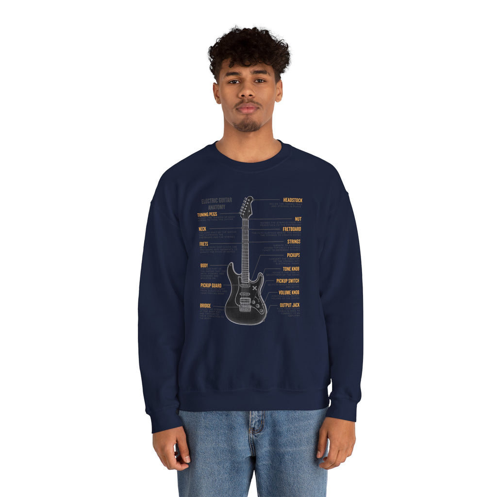 Person wearing a navy blue sweatshirt with a electric guitar anatomy diagram design on a white background