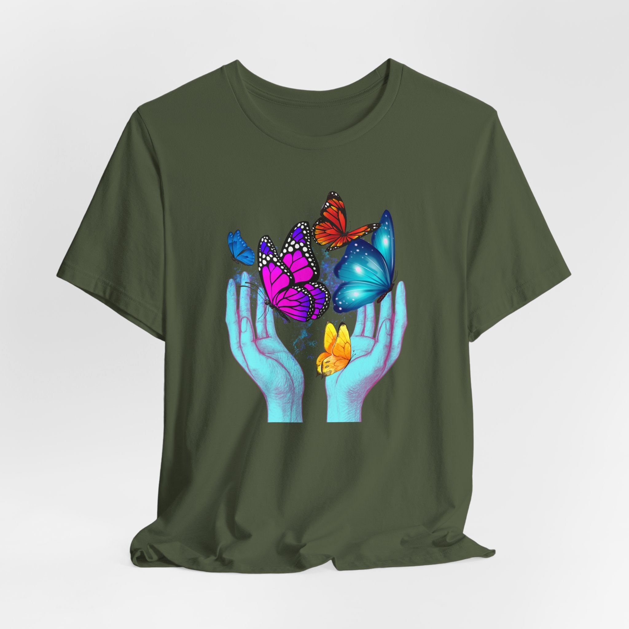 Green t-shirt with colorful butterfly design on a white background