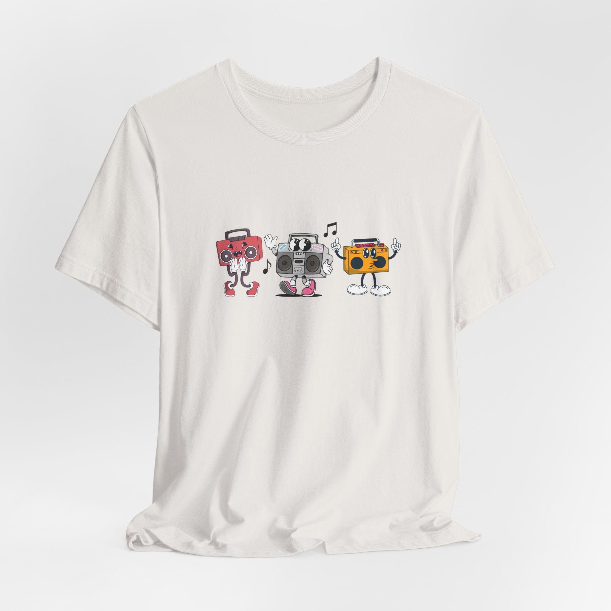 White t-shirt with cartoon boombox design on a white background